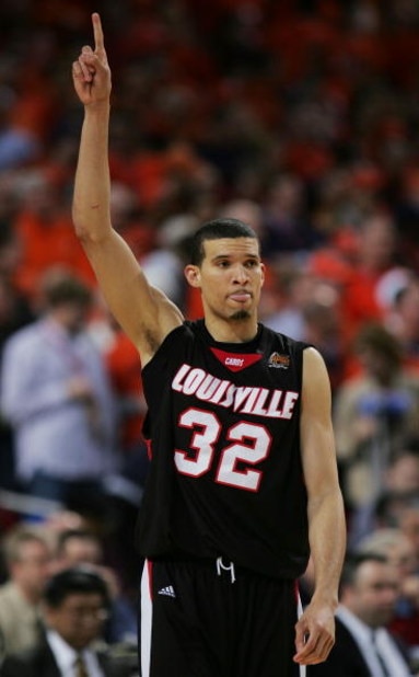 ST. LOUIS - APRIL 02:  Francisco Garcia #32 of the Louisville Cardinals gestures as he takes the court against the Illinois Fighting Illini during the NCAA Men's Final Four at the Edward Jones Dome on April 2, 2005 in St. Louis, Missouri.  (Photo by Ronal