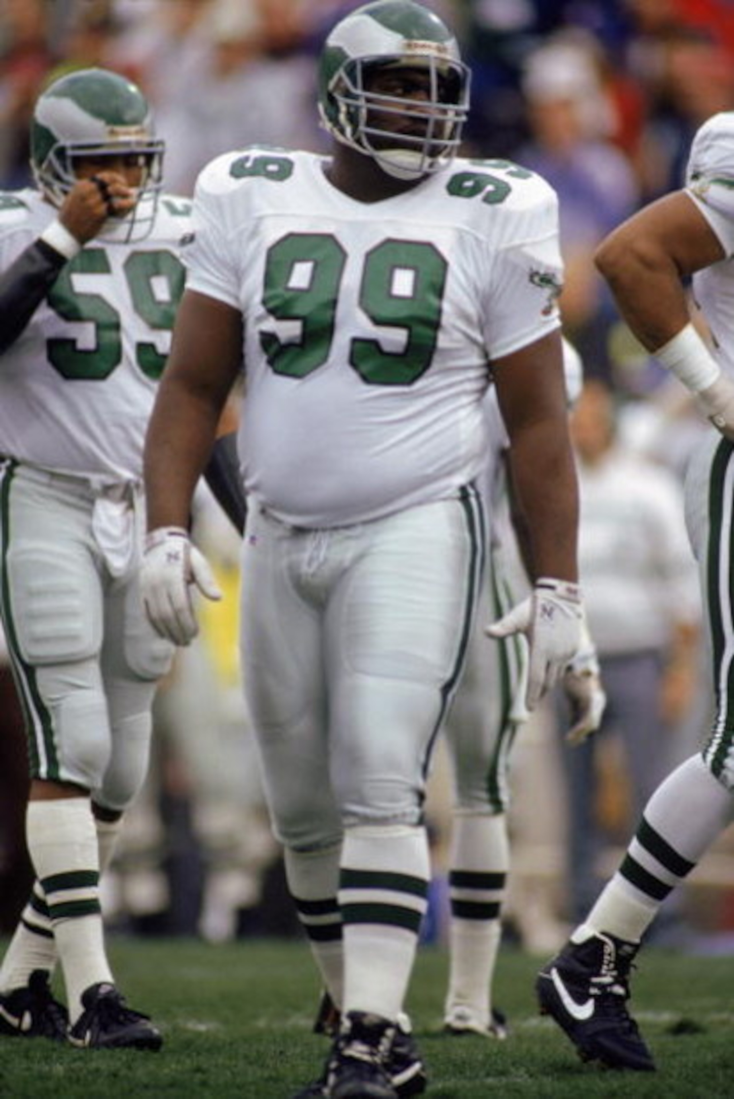 PHOENIX - DECEMBER 22:  Defensive linebacker Jerome Brown #99 of the Philadelphia Eagles walks on the field during the final regular season NFL game against Phoenix Cardinals on December 22, 1990 at Sun Devil Stadium in Phoenix, Arizona.  The Eagles defea