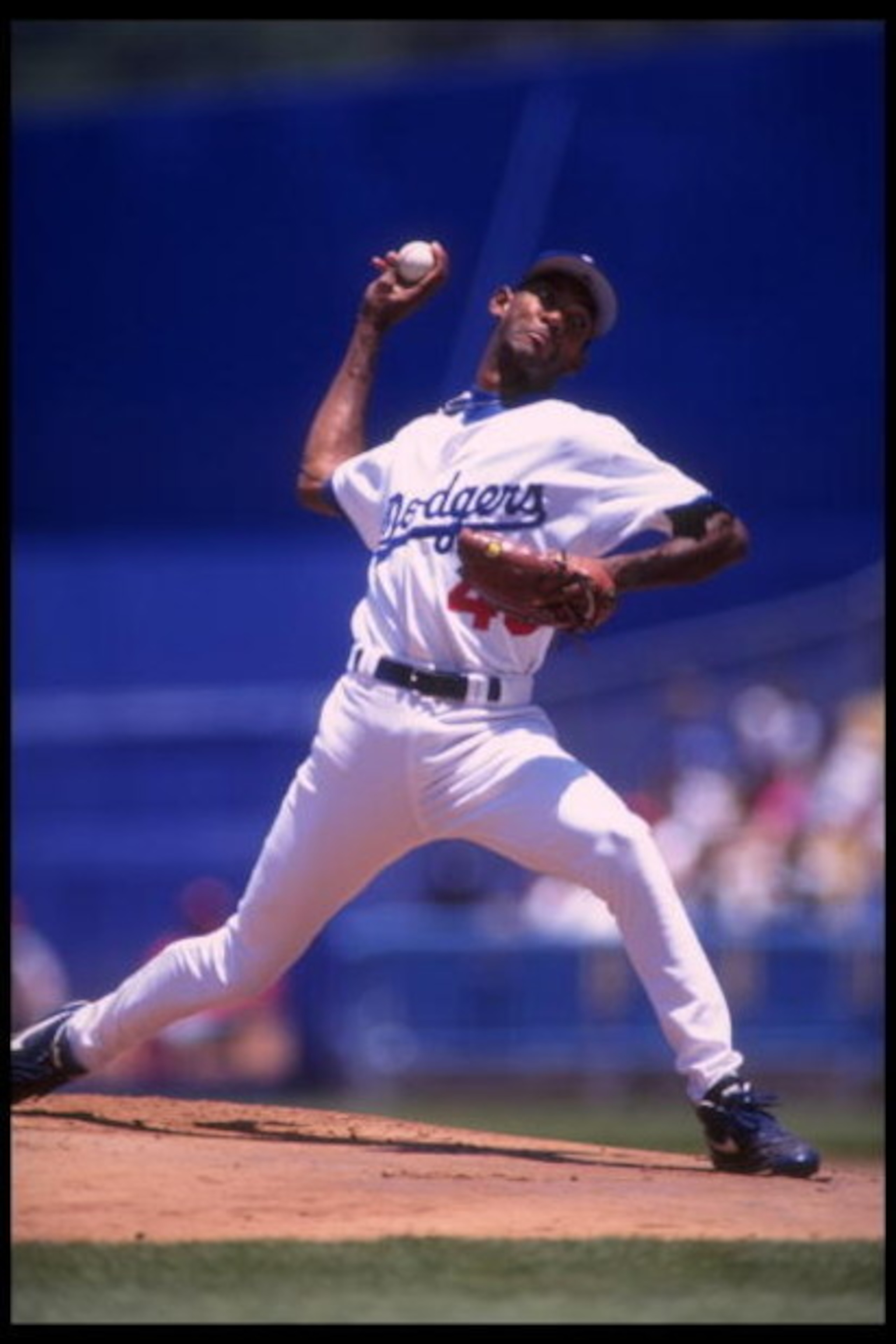 11 Jun 1995: Ramon Martinez of the Los Angeles Dodgers hurls a pitch in the direction of a Philadelphia Phillies at Dodger Stadium in Los Angeles, California.