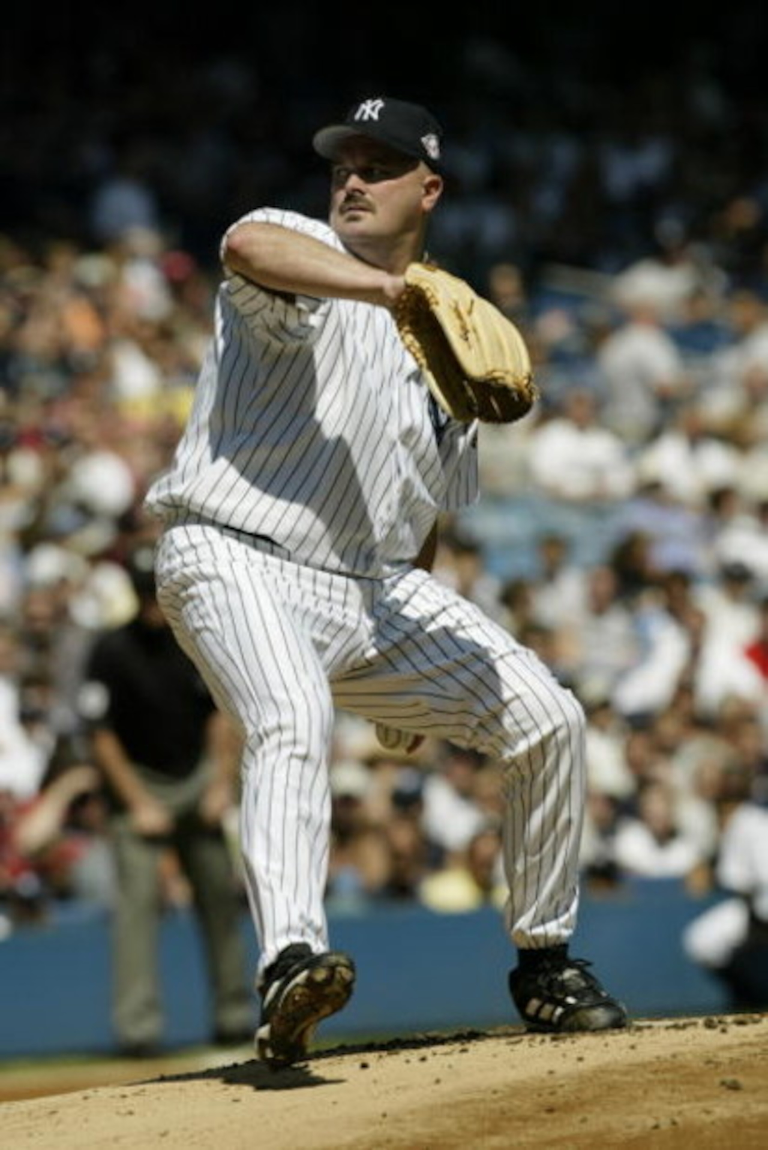 BRONX, NY - SEPTEMBER 7:  David Wells #33 of the New York Yankees pitches against the Boston Red Sox during the game at Yankee Stadium on September 7, 2003 in the Bronx, New York. The Yankees defeated the Red Sox 3-1. (Photo by Chris Trotman/Getty Images)