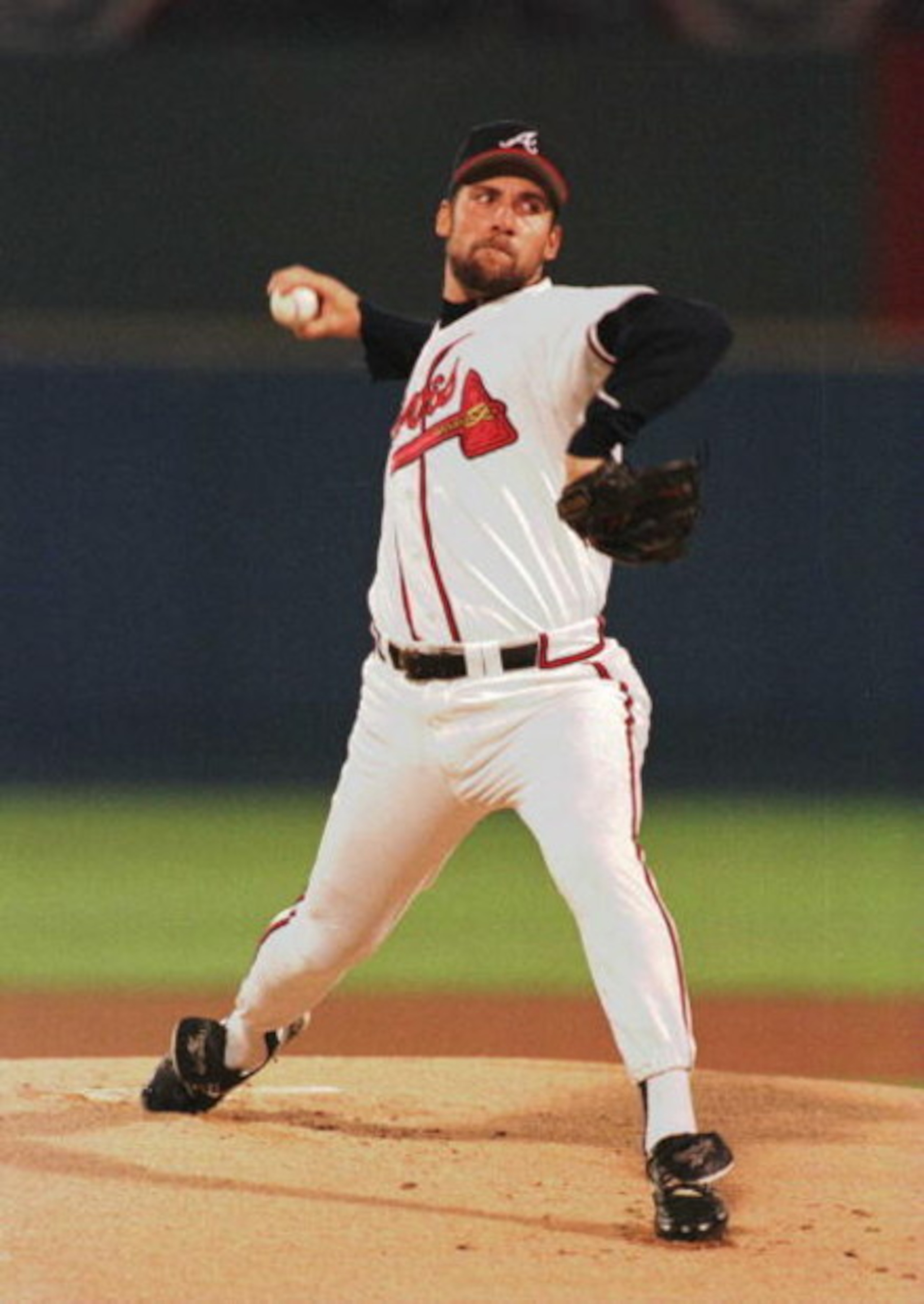 9 Oct 1996:  Pitcher John Smoltz of the Atlanta Braves winds up to throw a pitch during the Braves versus St. Louis Cardinals game 1 of the National League Championship Series at Fulton County Stadium in Atlanta, Georgia.  Mandatory Credit: Jonathan Danie