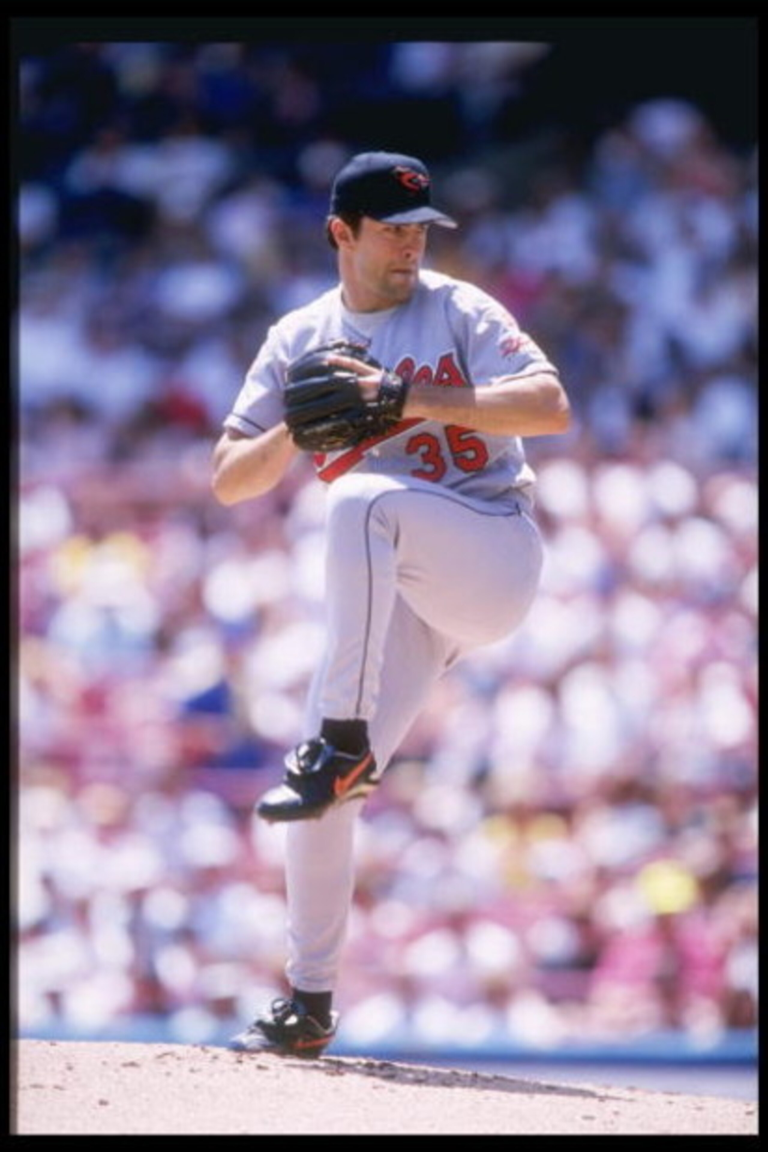 25 Jun 1997: Pitcher Mike Mussina of the Baltimore Orioles winds up to throw a pitch during the Orioles 9-1 win over the Milwaukee Brewers at Milwaukee County Stadium in Milwaukee, Wisconsin.