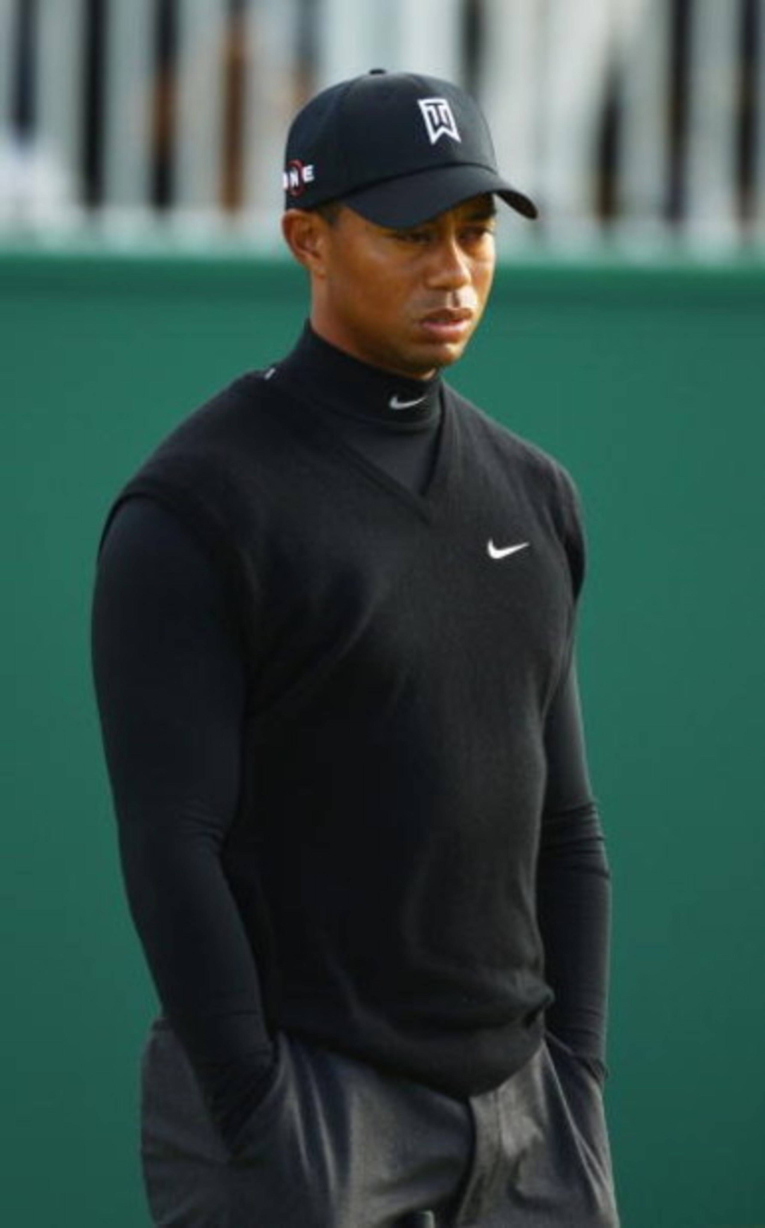 TURNBERRY, SCOTLAND - JULY 17:  Tiger Woods of USA leaves the 18th green during round two of the 138th Open Championship on the Ailsa Course, Turnberry Golf Club on July 17, 2009 in Turnberry, Scotland.  (Photo by Richard Heathcote/Getty Images)
