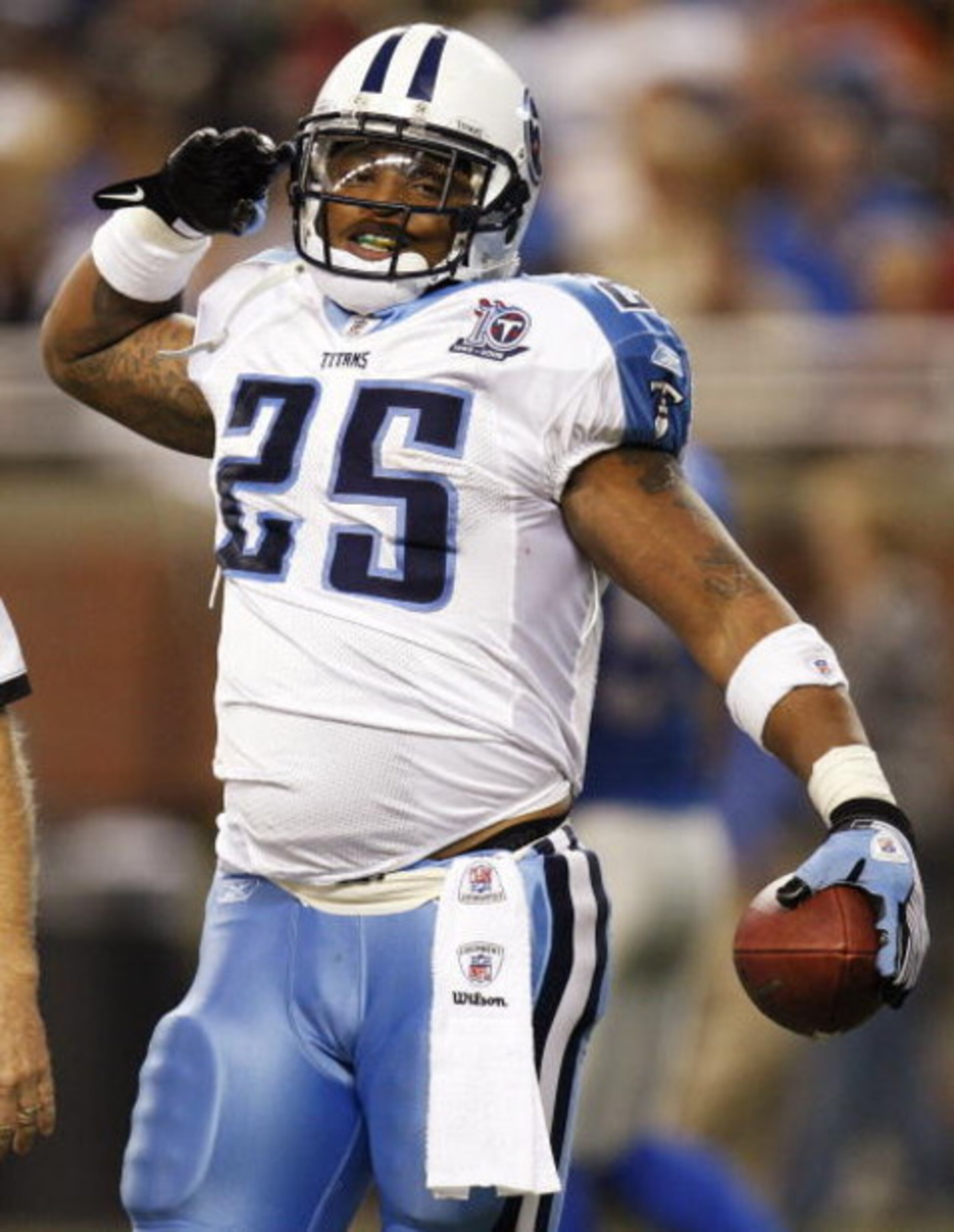 DETROIT , MI - NOVEMBER 27: LenDale White #25 of the Tennessee Titans celebrates a second quarter touchdown while playing the Detroit Lions on November 27, 2008 at Ford Field in Detroit, Michigan.  (Photo by Gregory Shamus/Getty Images)