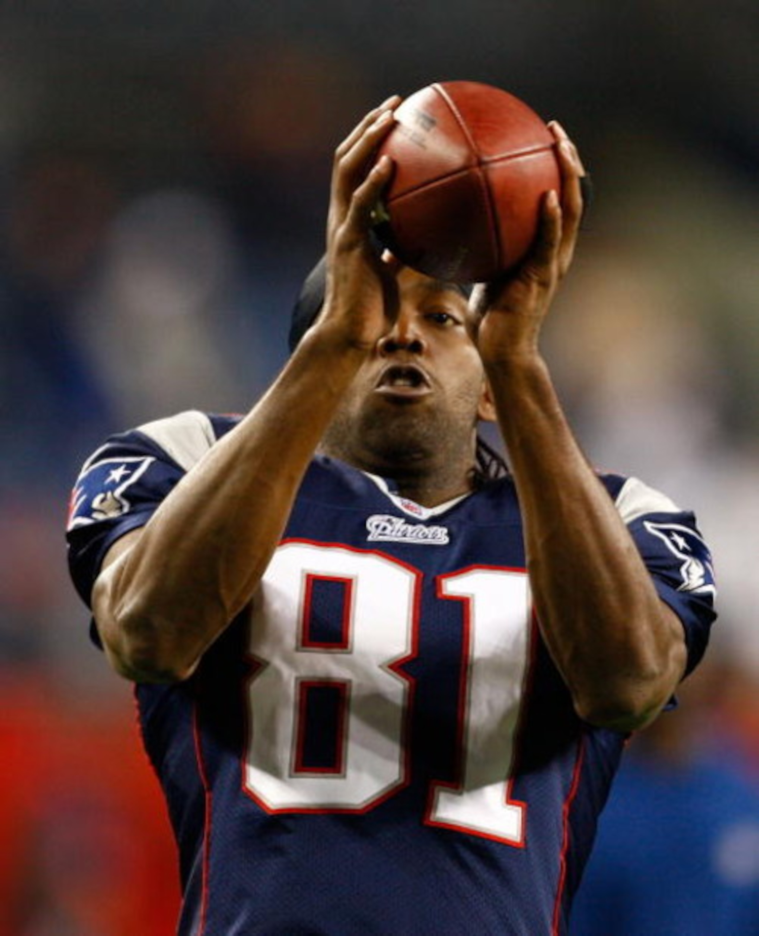 FOXBORO, MA - NOVEMBER 13: Randy Moss #81 of the New England Patriots makes a catch before a game with the New York Jets at Gillette Stadium on November 13, 2008 in Foxboro, Massachusetts. The Jets won 34-31 in overtime. (Photo by Jim Rogash/Getty Images)