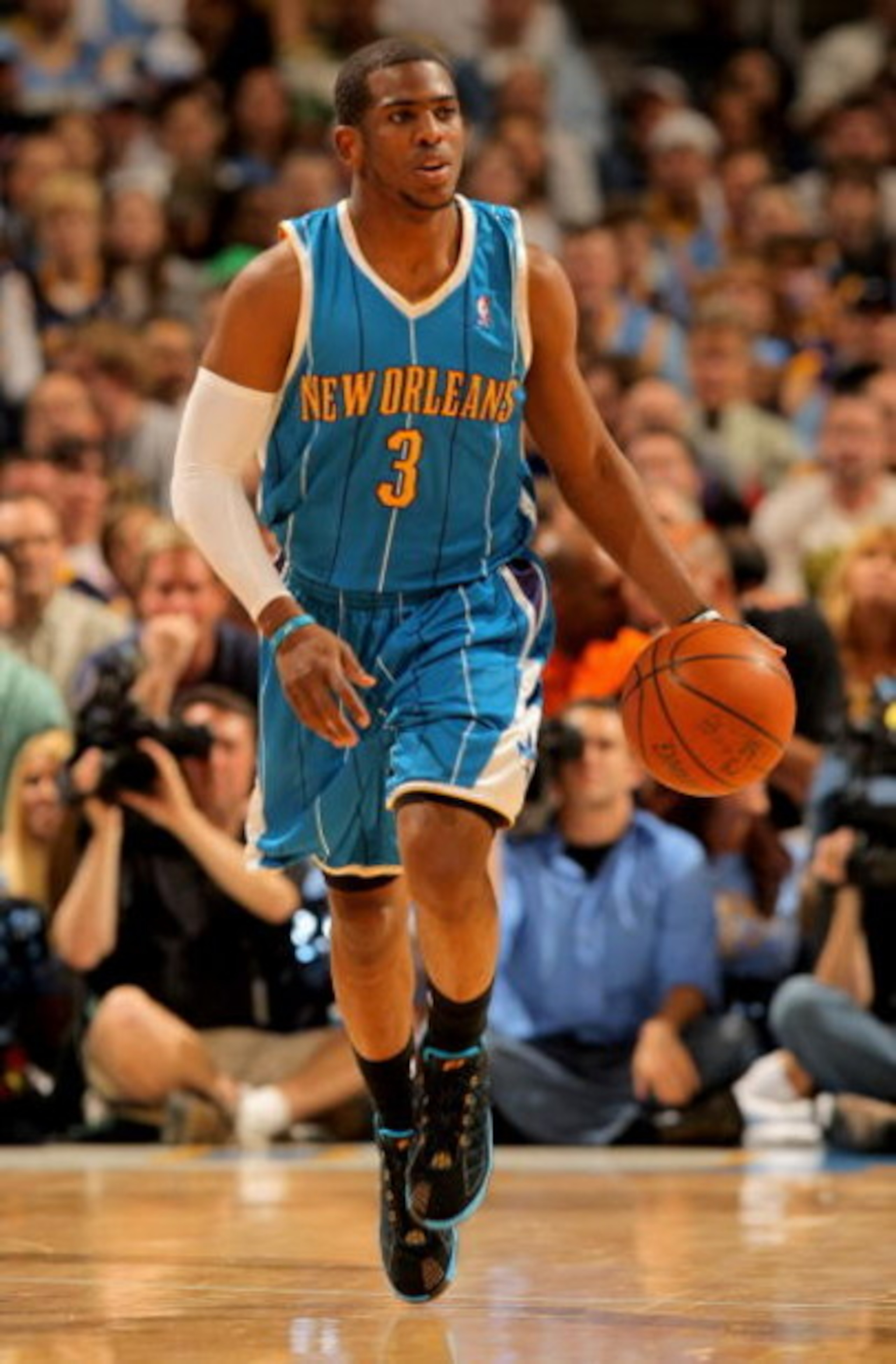 DENVER - APRIL 29:  Chris Paul #3 of the New Orleans Hornets brings the ball up court against the Denver Nuggets in Game Five of the Western Conference Quarterfinals during the 2009 NBA Playoffs at Pepsi Center on April 29, 2009 in Denver, Colorado. The N