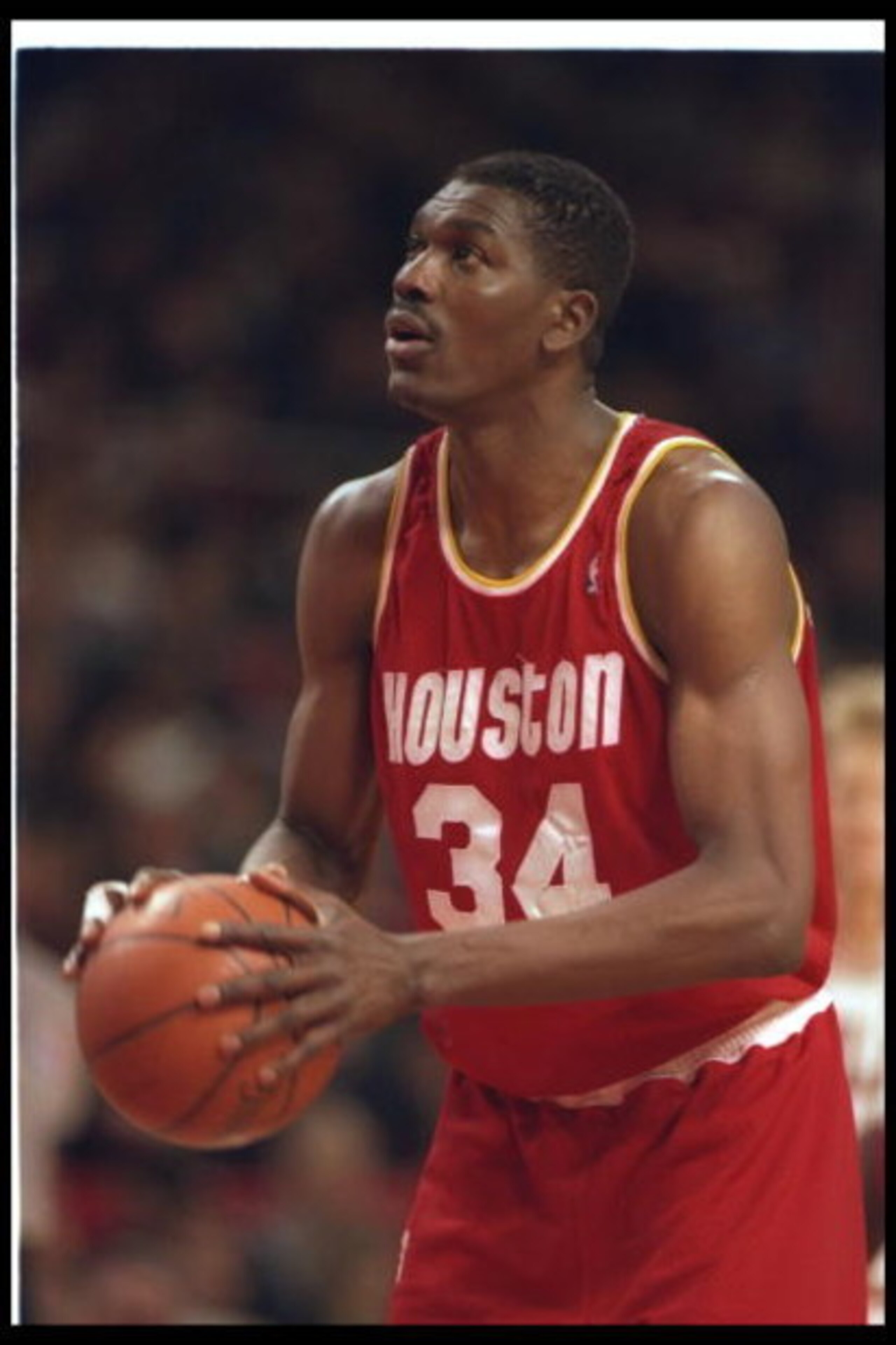 15 Jan 1994:  Center Hakeem Olajuwon of the Houston Rockets looks to shoot the ball during a game against the Chicago Bulls at the United Center in Chicago, Illinois. Mandatory Credit: ALLSPORT USA  /Allsport Mandatory Credit: ALLSPORT USA  /Allsport