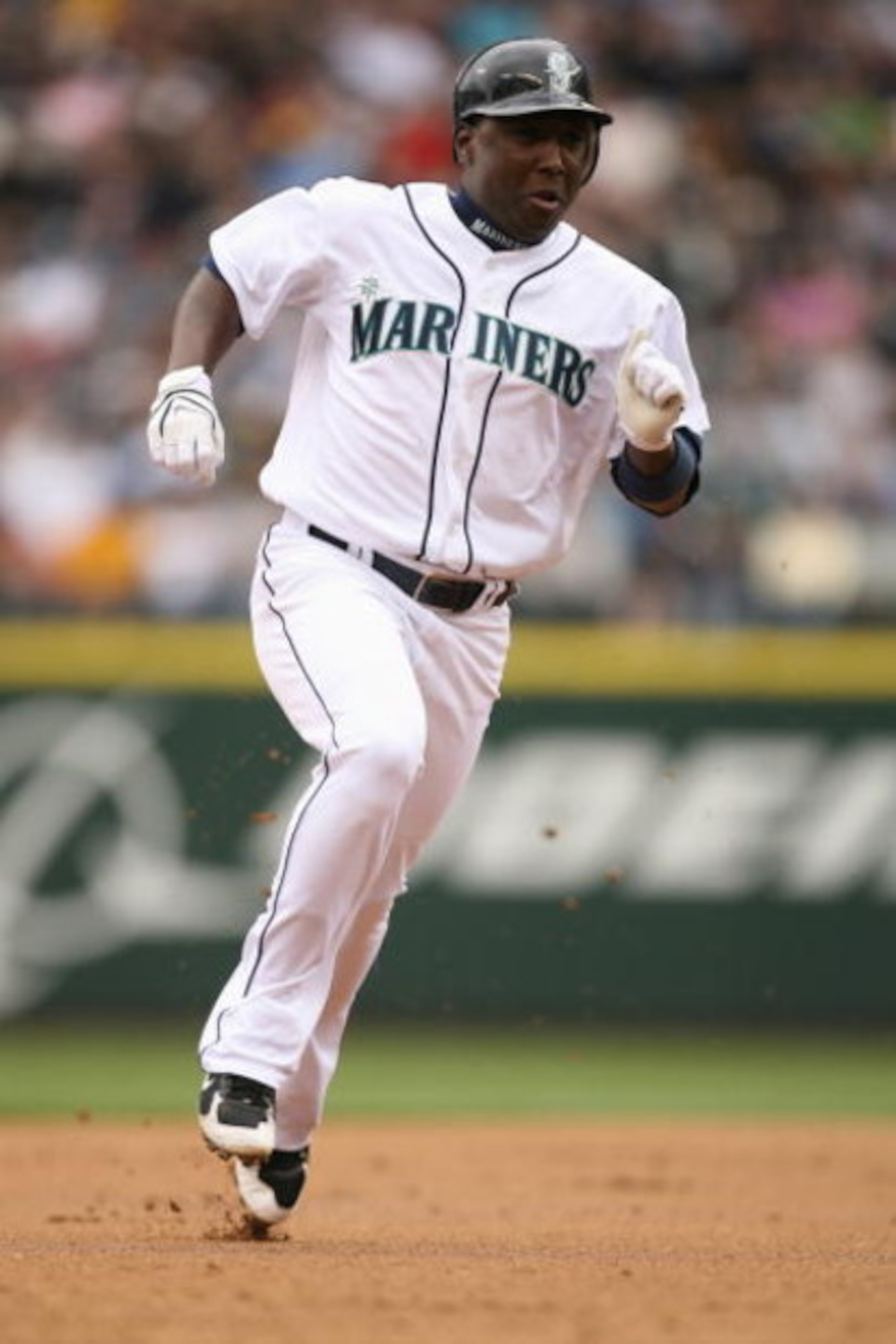 SEATTLE - APRIL 27:  Yuniesky Betancourt #5 of the Seattle Mariners runs the bases against the Oakland Athletics on April 27, 2008 at Safeco Field in Seattle, Washington. (Photo by Otto Greule Jr/Getty Images)