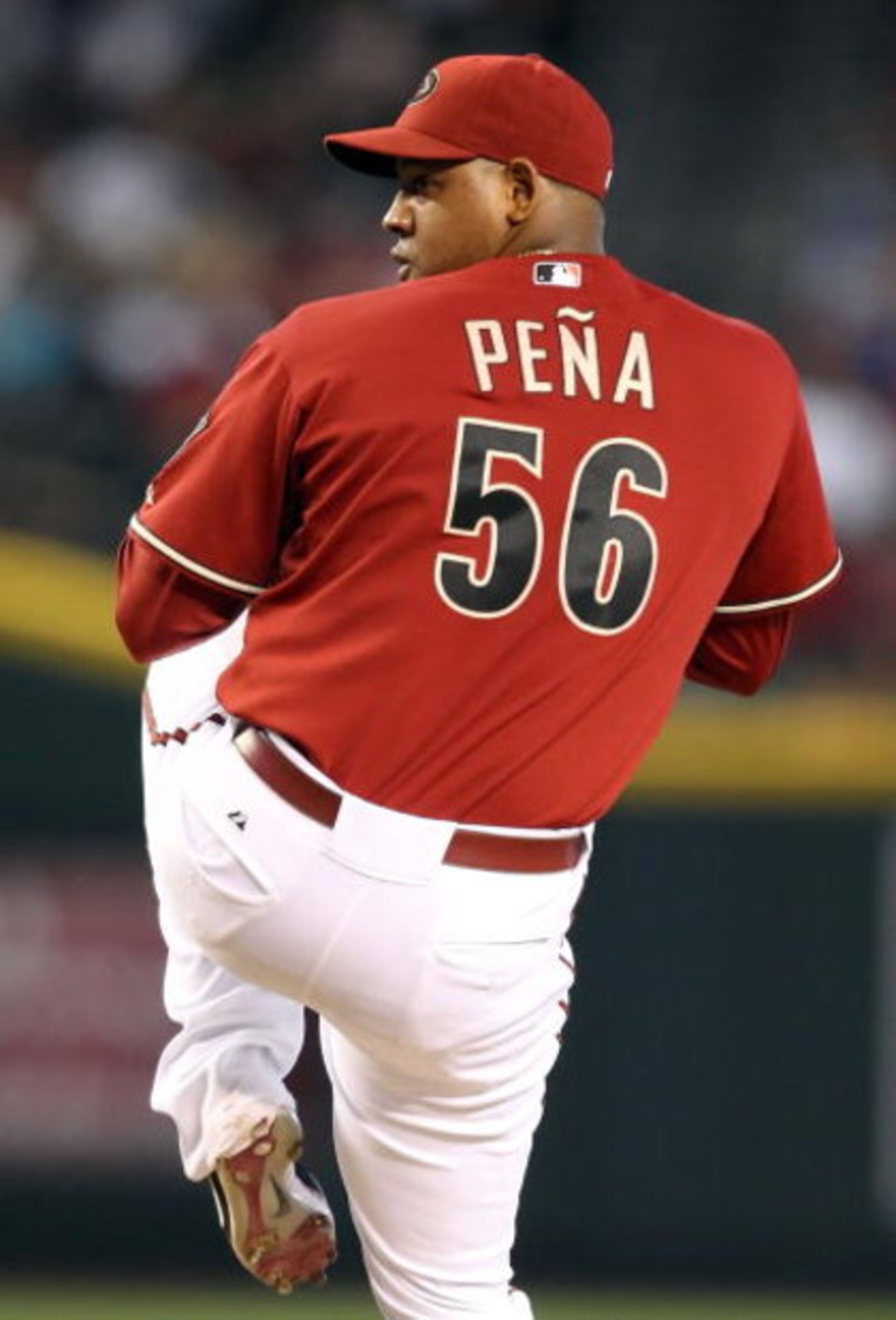 PHOENIX - JUNE 28:  Relief pitcher Tony Pena #56 of the Arizona Diamondbacks pitches against the Los Angeles Angels of Anaheim during the major league baseball game at Chase Field on June 28, 2009 in Phoenix, Arizona. The Angels defeated the Diamondbacks 