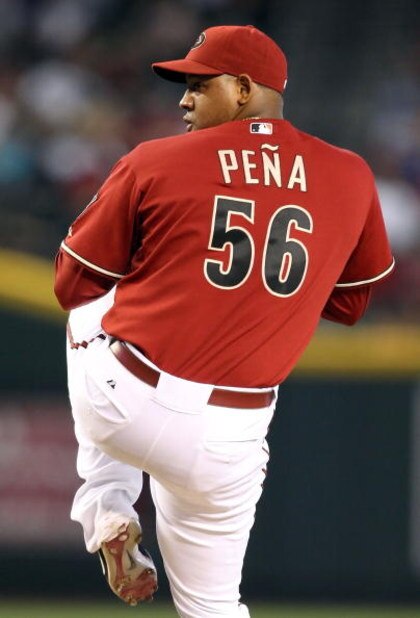 PHOENIX - JUNE 28:  Relief pitcher Tony Pena #56 of the Arizona Diamondbacks pitches against the Los Angeles Angels of Anaheim during the major league baseball game at Chase Field on June 28, 2009 in Phoenix, Arizona. The Angels defeated the Diamondbacks 