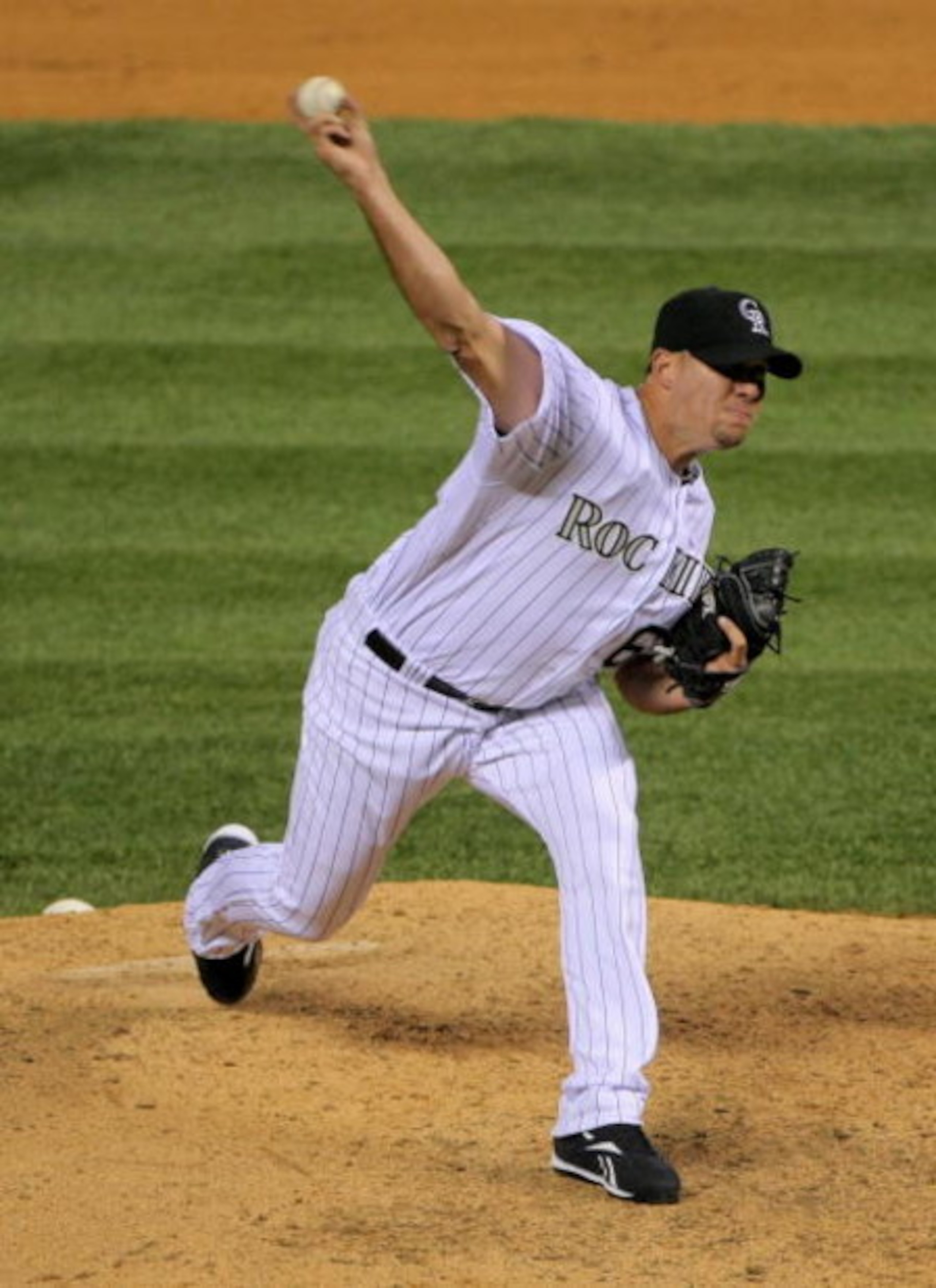DENVER - JULY 24:  Relief pitcher Rafael Betancourt #63 of the Colorado Rockies makes his debut with the Rockies as he faces the the San Francisco Giants in the ninth inning at Coors Field on July 24, 2009 in Denver, Colorado. Bentancourt pitched a perfec