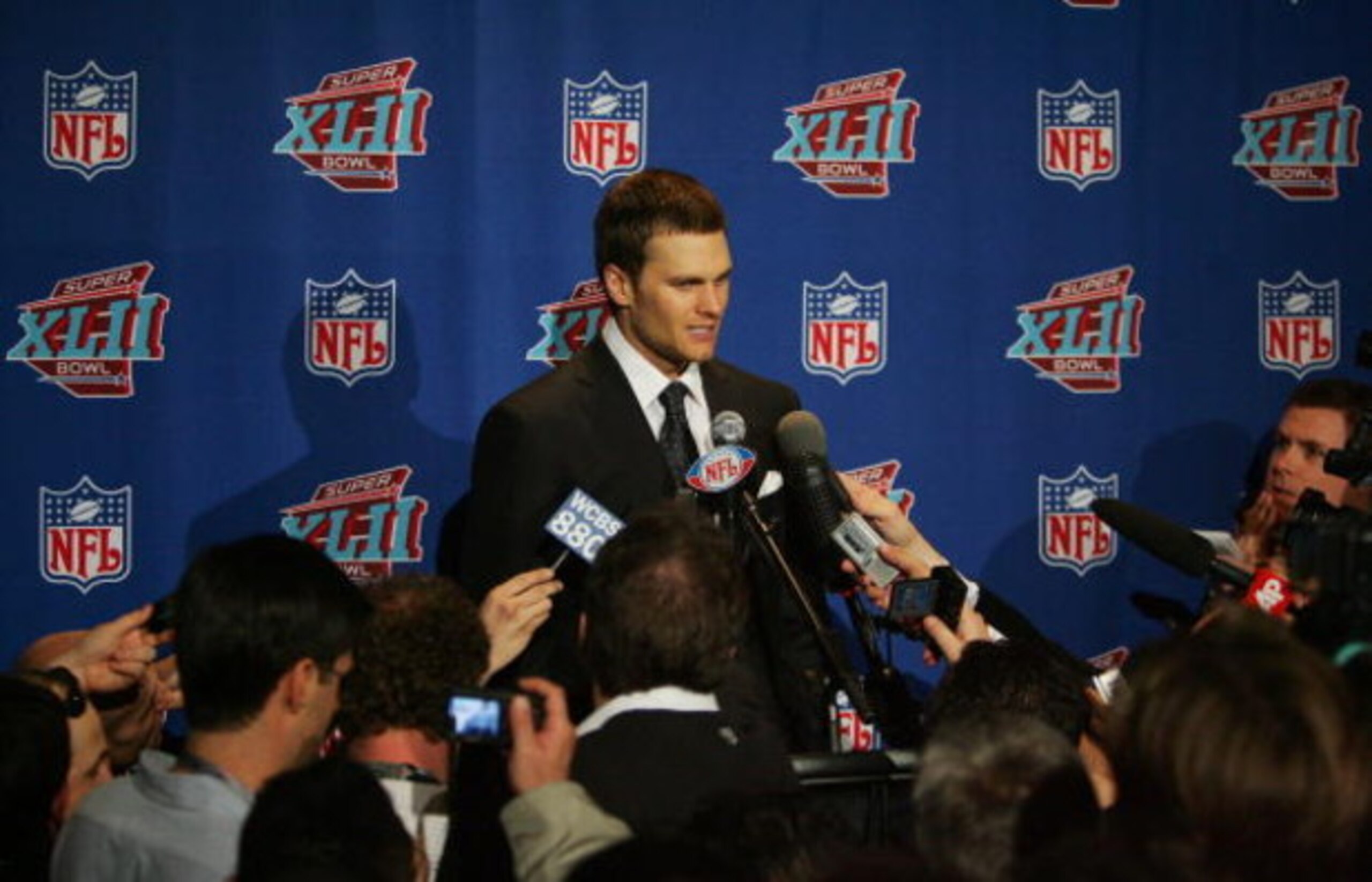 GLENDALE, AZ - FEBRUARY 03: Tom Brady #12 of the New England Patriots answers questions after losing to the New York Giants 17-14 in Super Bowl XLII on February 3, 2008 at the University of Phoenix Stadium in Glendale, Arizona. (Photo by Streeter Lecka/ GLENDALE, AZ - FEBRUARY 03: Tom Brady #12 of the New England Patriots answers questions after losing to the New York Giants 17-14 in Super Bowl XLII on February 3, 2008 at the University of Phoenix Stadium in Glendale, Arizona. (Photo by Streeter Lecka/