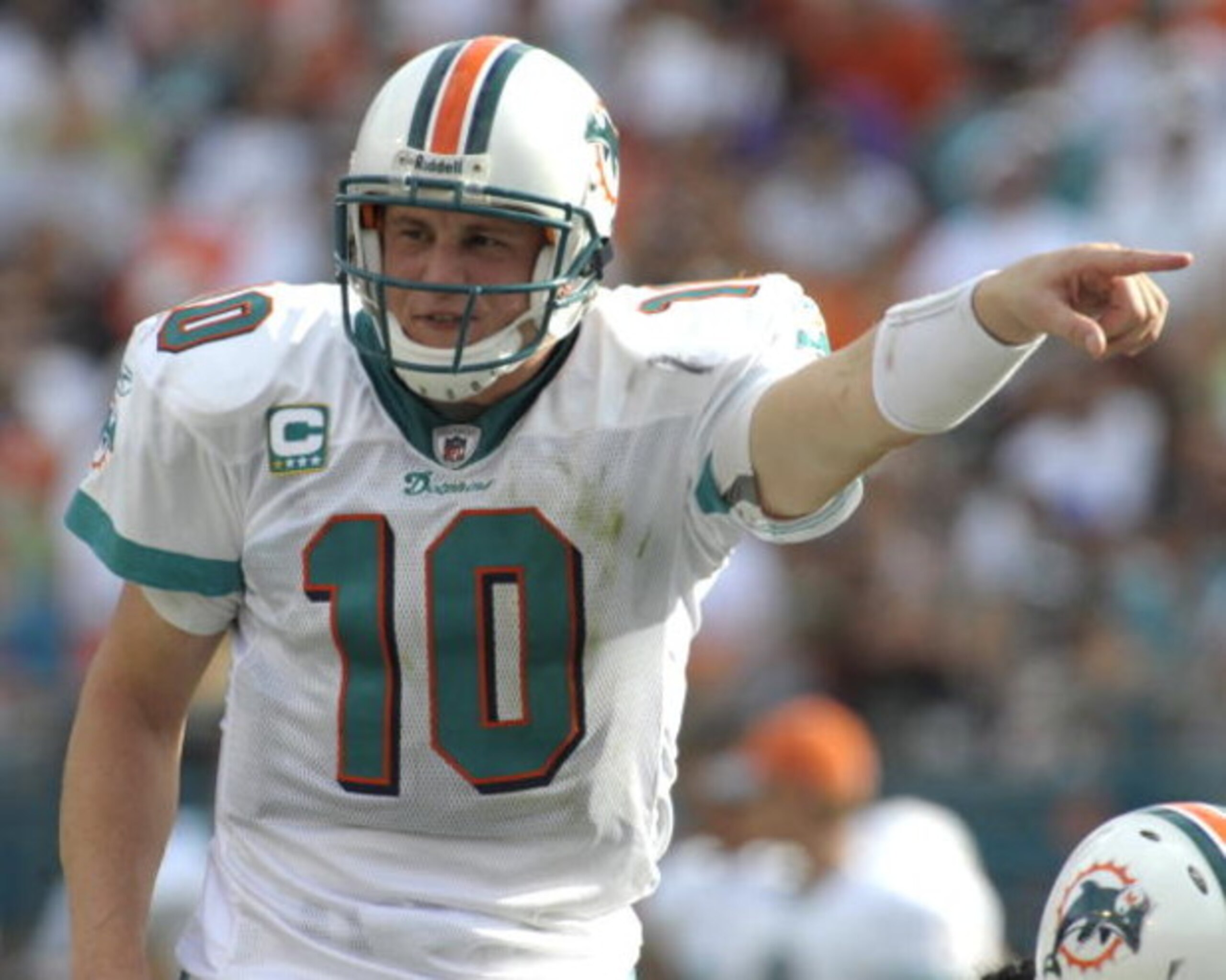 MIAMI, FL - JANUARY 4: Quarterback Chad Pennington #10 of the Miami Dolphins directs play against the Baltimore Ravens in an NFL Wildcard Playoff Game at Dolphins Stadium on January 4, 2009 in Miami, Florida. (Photo by Al Messerschmidt/Getty Images) MIAMI, FL - JANUARY 4: Quarterback Chad Pennington #10 of the Miami Dolphins directs play against the Baltimore Ravens in an NFL Wildcard Playoff Game at Dolphins Stadium on January 4, 2009 in Miami, Florida. (Photo by Al Messerschmidt/Getty Images)
