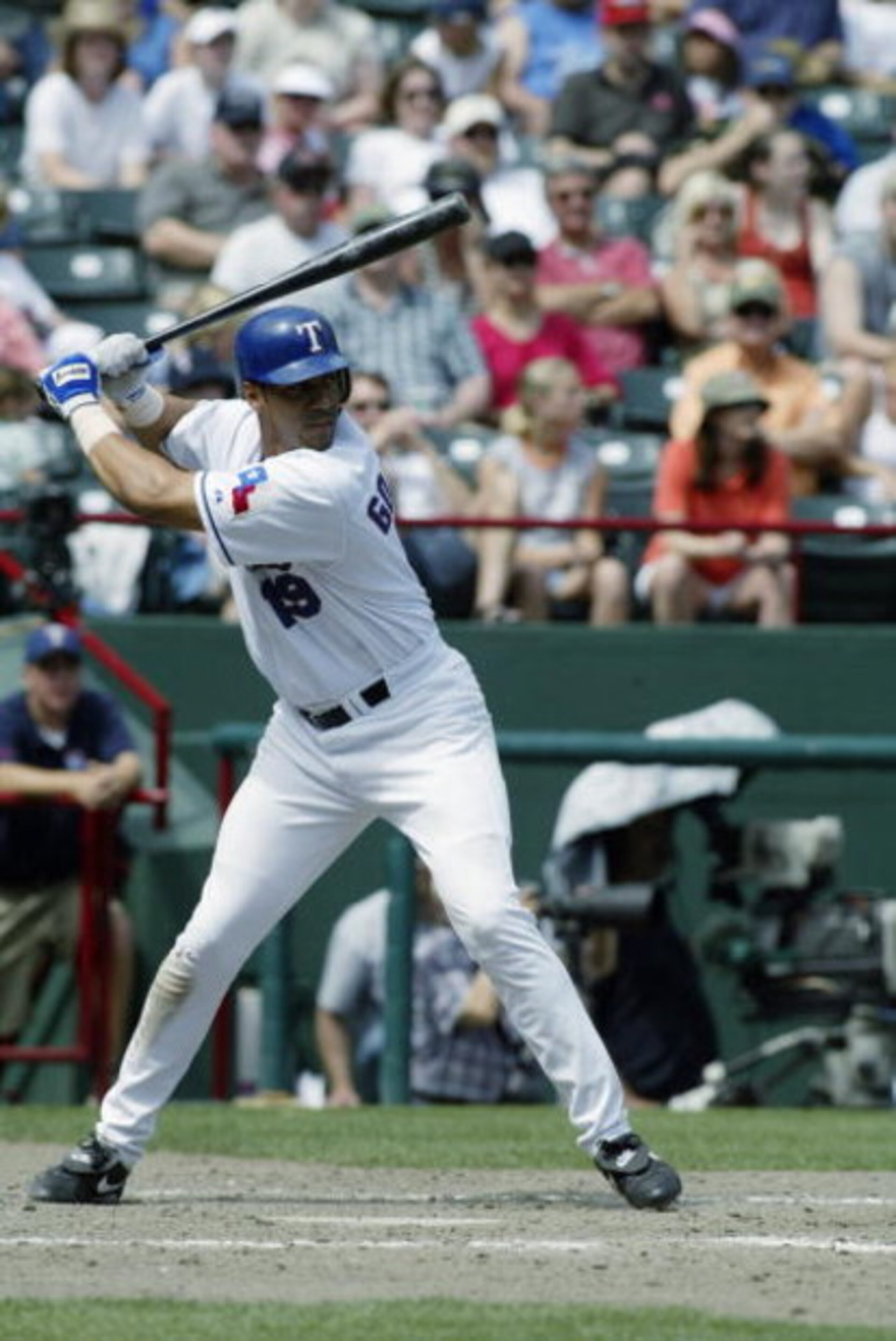 ARLINGTON, TX - MAY 11:  Juan Gonzalez #19 of the Texas Rangers stands at bat during the game against the Cleveland Indians at the Ballpark in Arlington on May 11, 2003 in Arlington, Texas.  The Rangers defeated the Indians 17-10.  (Photo by Ronald Martin