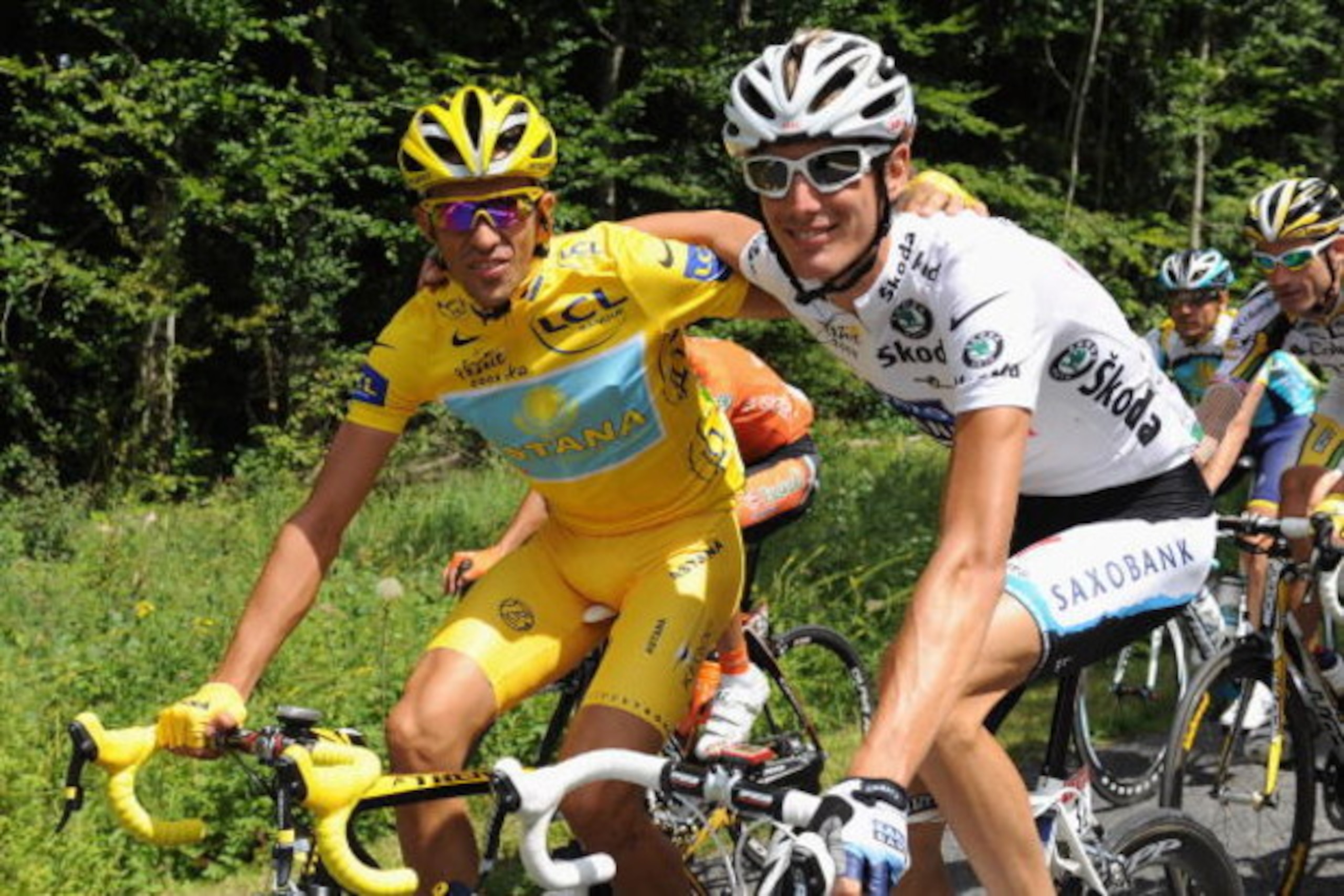 PARIS - JULY 26:  Yellow Jersey holder Alberto Contador of Spain and Astana (L) rides with White Jersey holder Andy Schleck of Luxembourg and Saxo Bank during Stage Twenty One of the Tour de France on July 26, 2009 in Paris, France.  (Photo by Jasper Juin