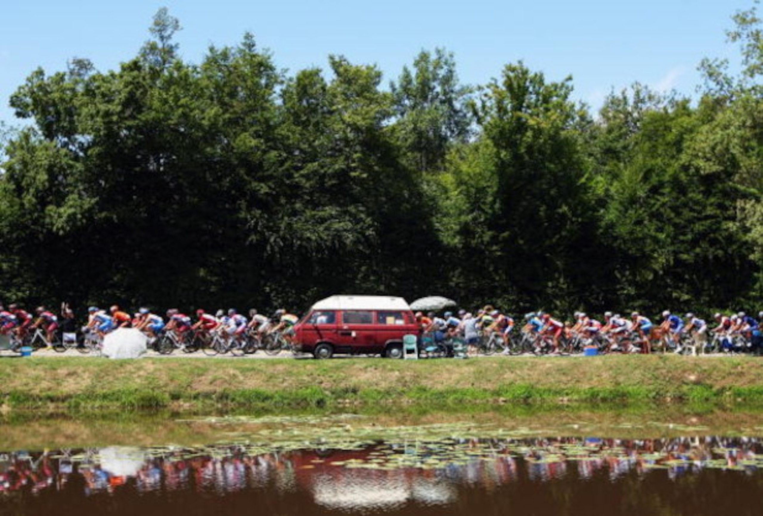 AUBENAS, FRANCE - JULY 24:  The peloton ride past a lake during stage 19 of the 2009 Tour de France from Bourgoin-Jallieu to Aubenas on July 24, 2009 in Aubenas, France.  (Photo by Bryn Lennon/Getty Images)