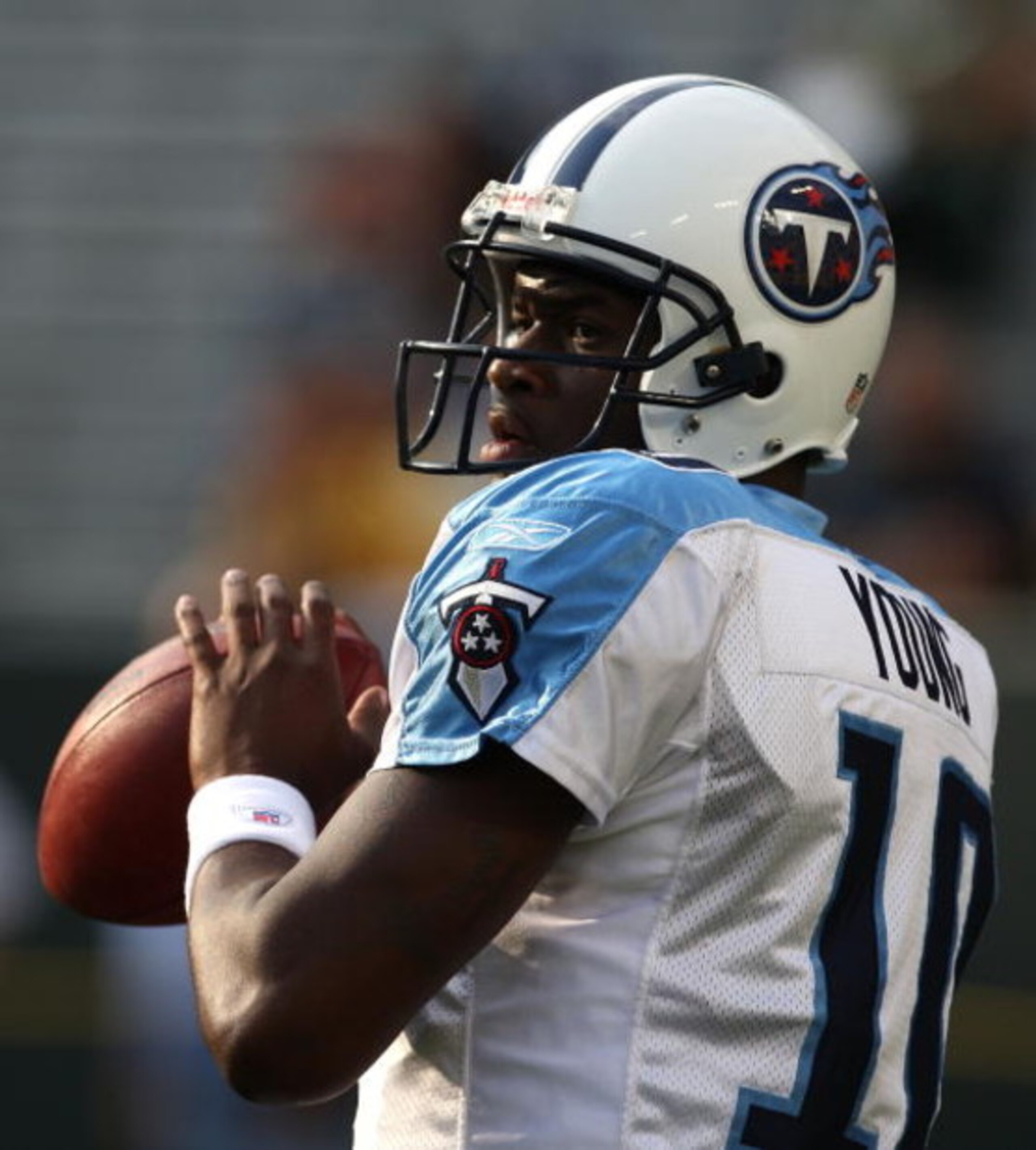 GREEN BAY, WI - AUGUST 28: Vince Young #10 of the Tenessee Titans warms-up before a game against the Green Bay Packers on August 28, 2008 at Lambeau Field in Green Bay, Wisconsin. The Titans defeated the Packers 23-21. (Photo by Jonathan Daniel/Getty Imag