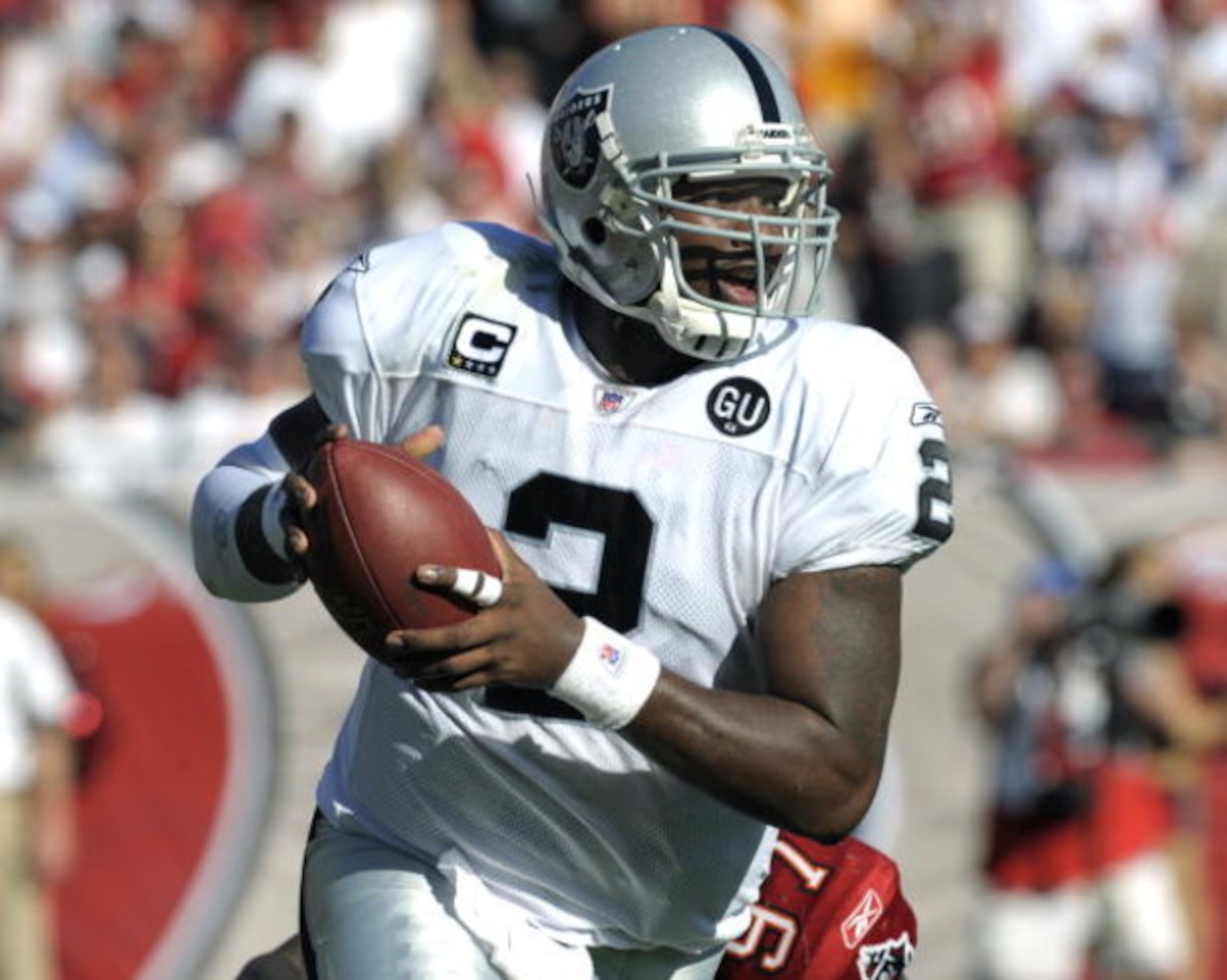 TAMPA, FL - DECEMBER 28: Quarterback JaMarcus Russell #2 of the Oakland Raiders looks upfield against the Tampa Bay Buccaneers at Raymond James Stadium on December 28, 2008 in Tampa, Florida.  (Photo by Al Messerschmidt/Getty Images)