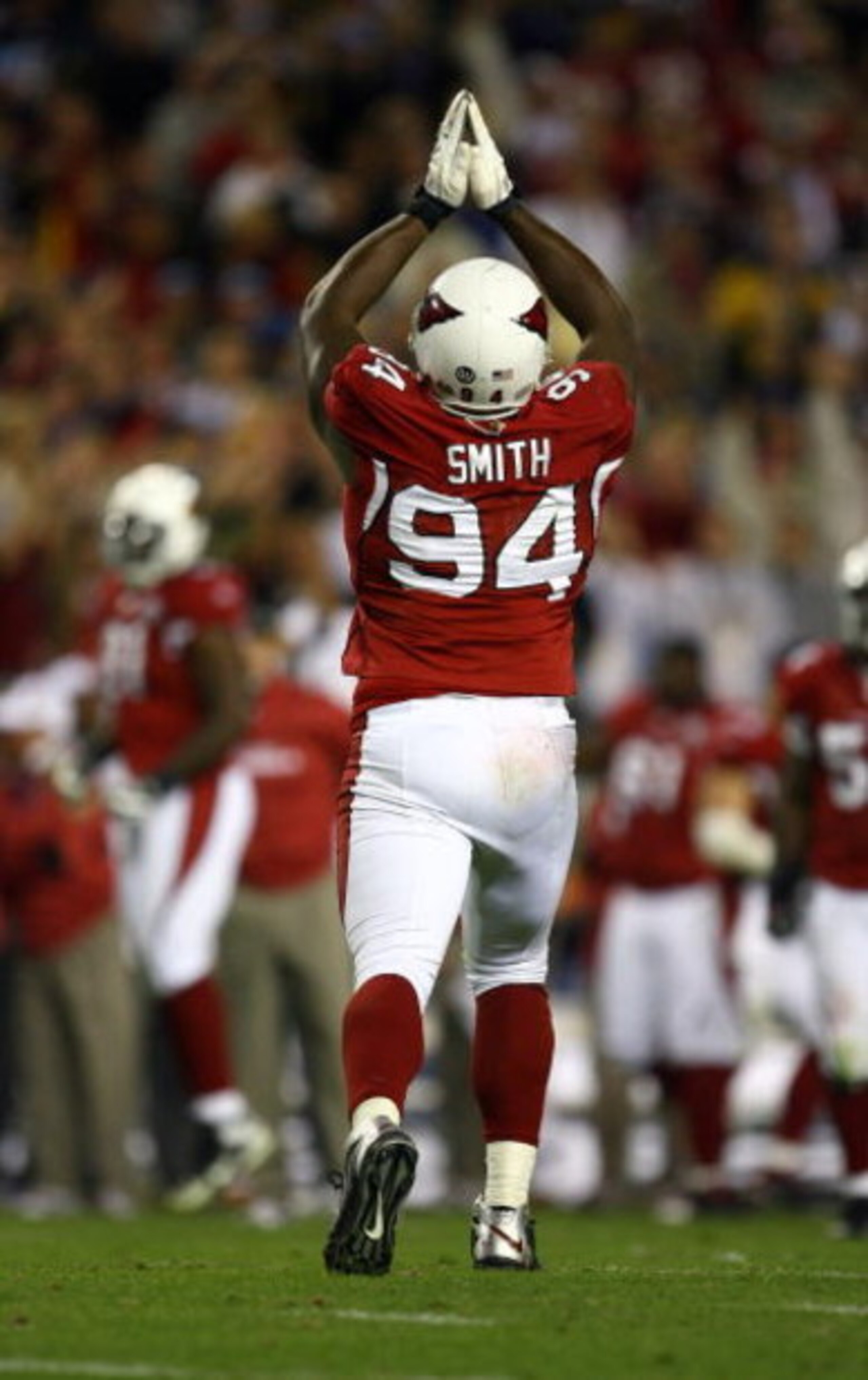 TAMPA, FL - FEBRUARY 01:  Antonio Smith #94 of the Arizona Cardinals signals for a safety after Justin Hartwig #62 of the Pittsburgh Steelers was called for holding in the endzone which resulted in the endzone during the fourth quarter of Super Bowl XLIII