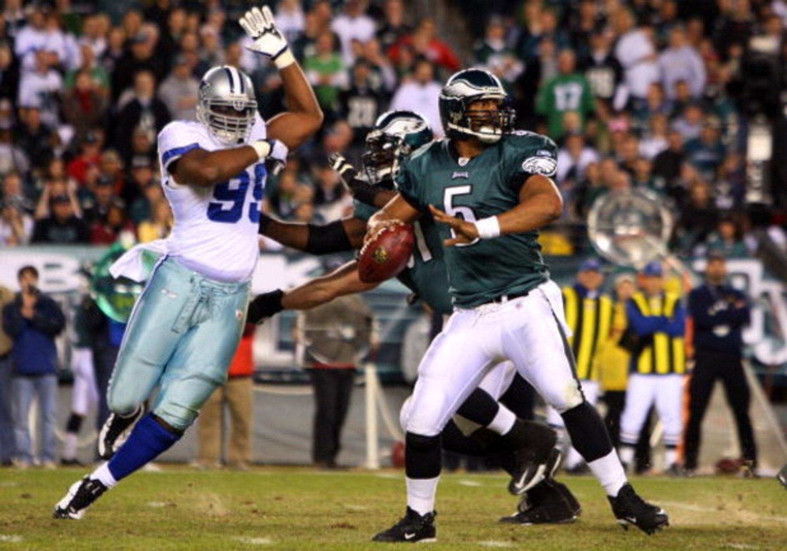 PHILADELPHIA - DECEMBER 28: Donovan McNabb #5 of the Philadelphia Eagles throws a pass against the Dallas Cowboys on December 28, 2008 at Lincoln Financial Field in Philadelphia, Pennsylvania. (Photo by Jim McIsaac/Getty Images) PHILADELPHIA - DECEMBER 28: Donovan McNabb #5 of the Philadelphia Eagles throws a pass against the Dallas Cowboys on December 28, 2008 at Lincoln Financial Field in Philadelphia, Pennsylvania. (Photo by Jim McIsaac/Getty Images)