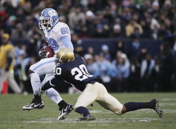SOUTH BEND, IN - NOVEMBER 04:  Hakeem Nicks #88 of the North Carolina Tar Heels breaks away from Terrail Lambert #20 of the Notre Dame Fighting Irish on his way to a 70 yard touchdown on November 4, 2006 at Notre Dame Stadium in South Bend, Indiana. (Phot
