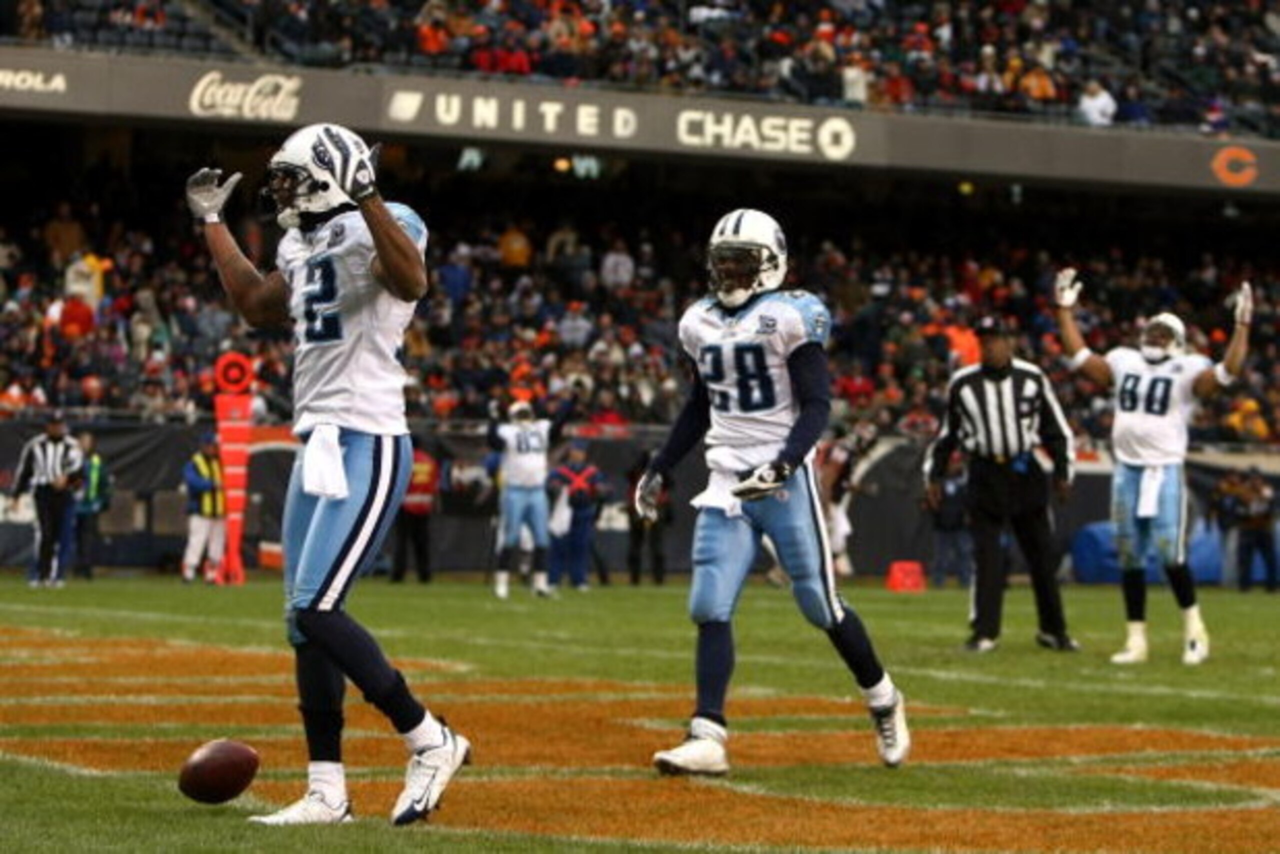 CHICAGO - NOVEMBER 09: (L-R) Justin Gage #12, Chris Johnson #28 and Bo Scaife #80 of the Tennessee Titans celebrate after Gage scored on a 12-yard recpetion in the third quarter against the Chicago Bears at Soldier Field on November 9, 2008 in Chicago, I CHICAGO - NOVEMBER 09: (L-R) Justin Gage #12, Chris Johnson #28 and Bo Scaife #80 of the Tennessee Titans celebrate after Gage scored on a 12-yard recpetion in the third quarter against the Chicago Bears at Soldier Field on November 9, 2008 in Chicago, I