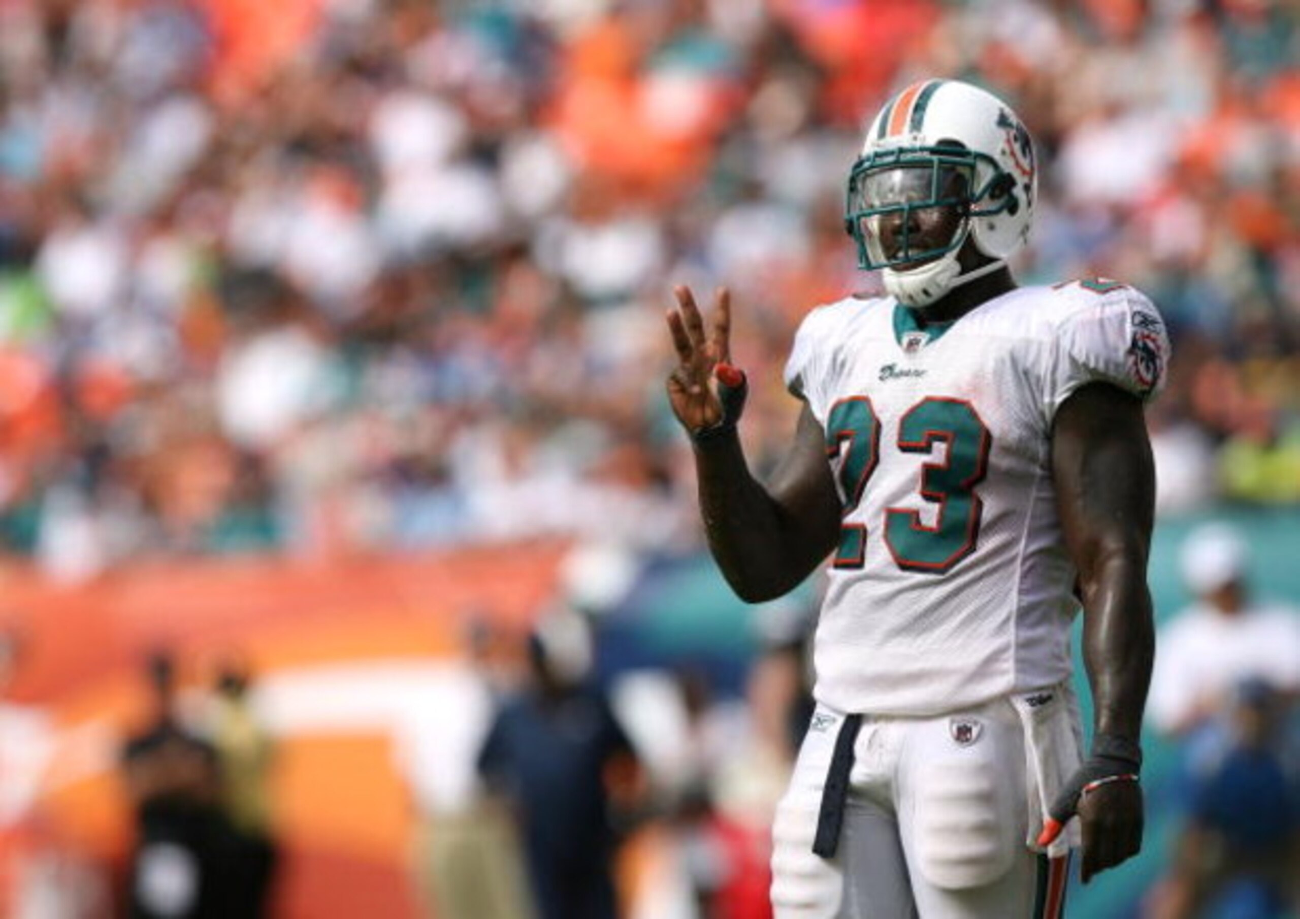 MIAMI - OCTOBER 05:  Running back Ronnie Brown #23 of the Miami Dolphins gestures to the sidelines while taking on the San Diego Chargers at Dolphin Stadium on October 5, 2008 in Miami, Florida. The Dolphins defeated the Chargers 17-10.  (Photo by Doug Be