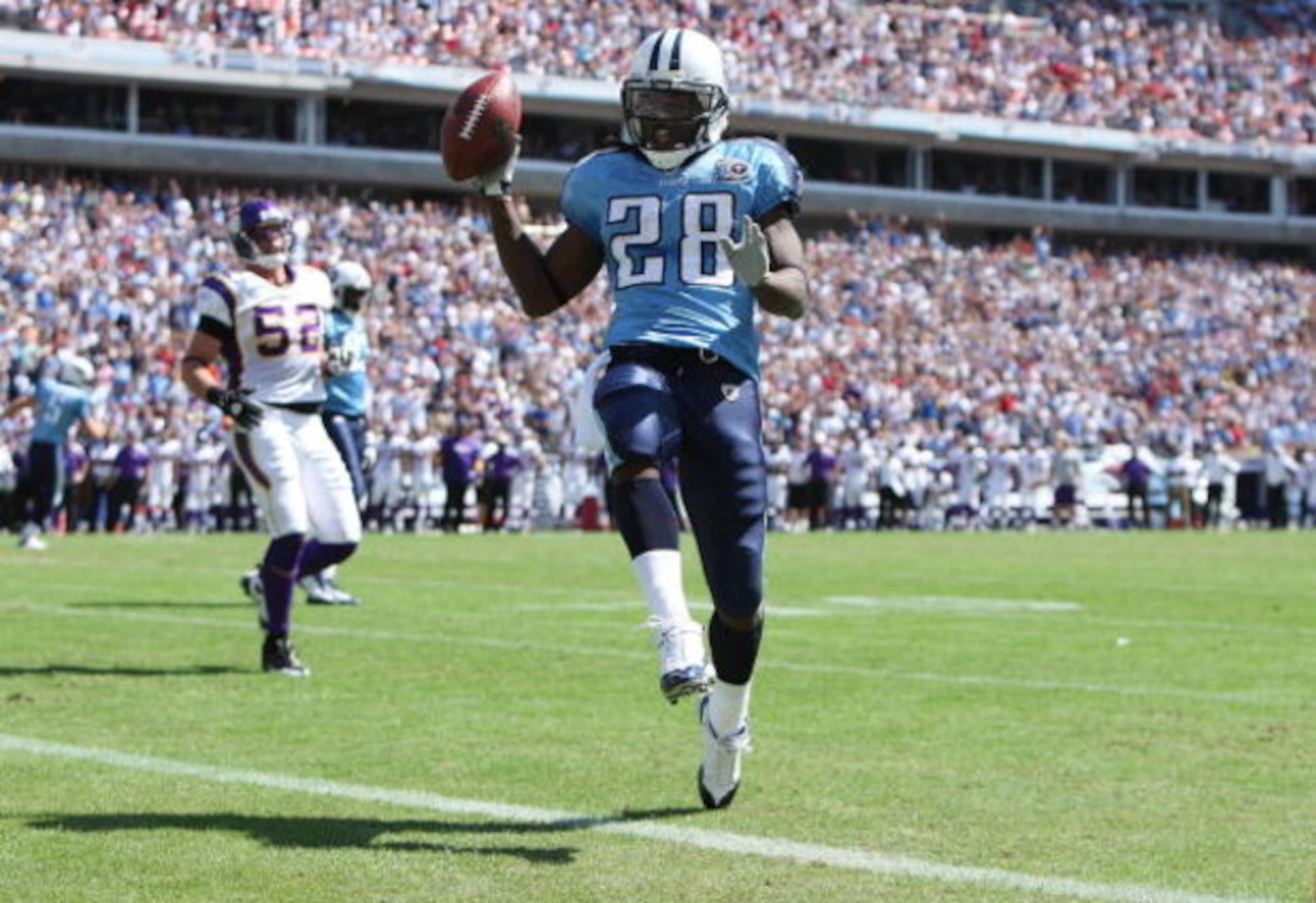 NASHVILLE, TN - SEPTEMBER 28:  Running back Chris Johnson #28 of the Tennessee Titans celebrates as he scores a touchdown against the Minnesota Vikings at LP Field on September 28, 2008 in Nashville, Tennessee.  (Photo by Doug Benc/Getty Images)