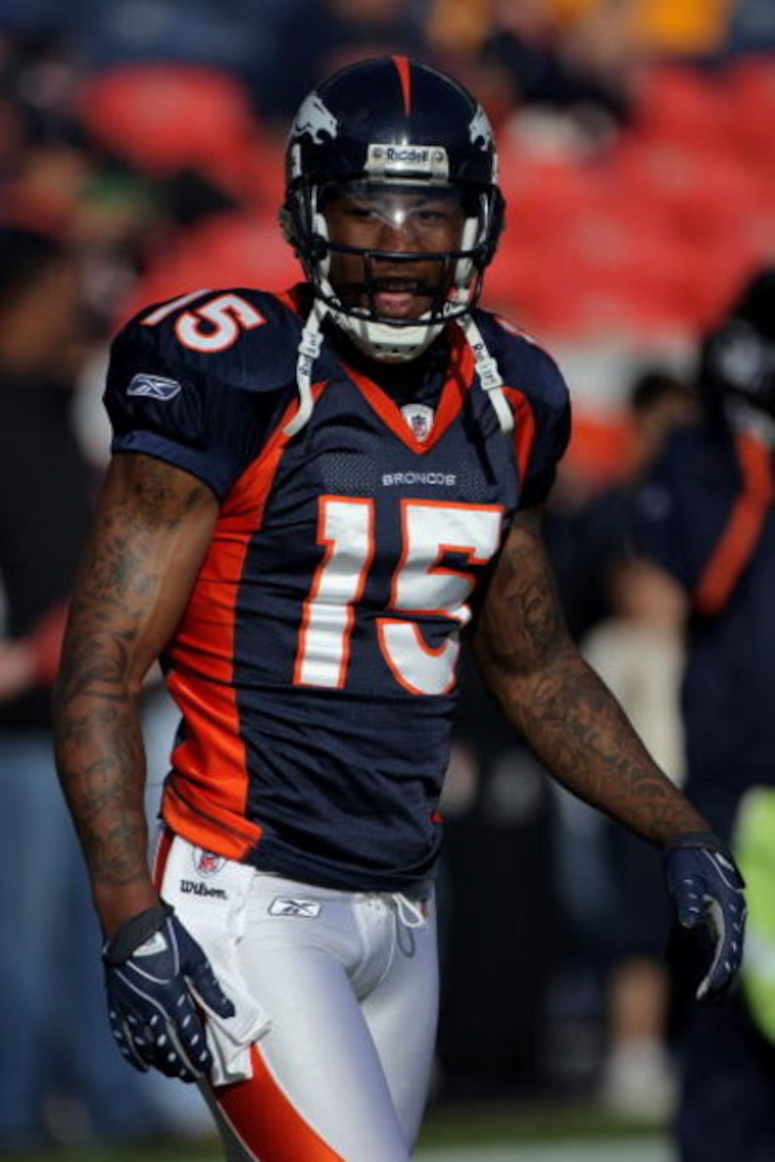 DENVER - NOVEMBER 23:  Wide receiver Brandon Marshall #15 of the Denver Broncos warms up prior to facing the Oakland Raiders during week 12 NFL action at Invesco Field at Mile High on November 23, 2008 in Denver, Colorado. The Raiders defeated the Broncos