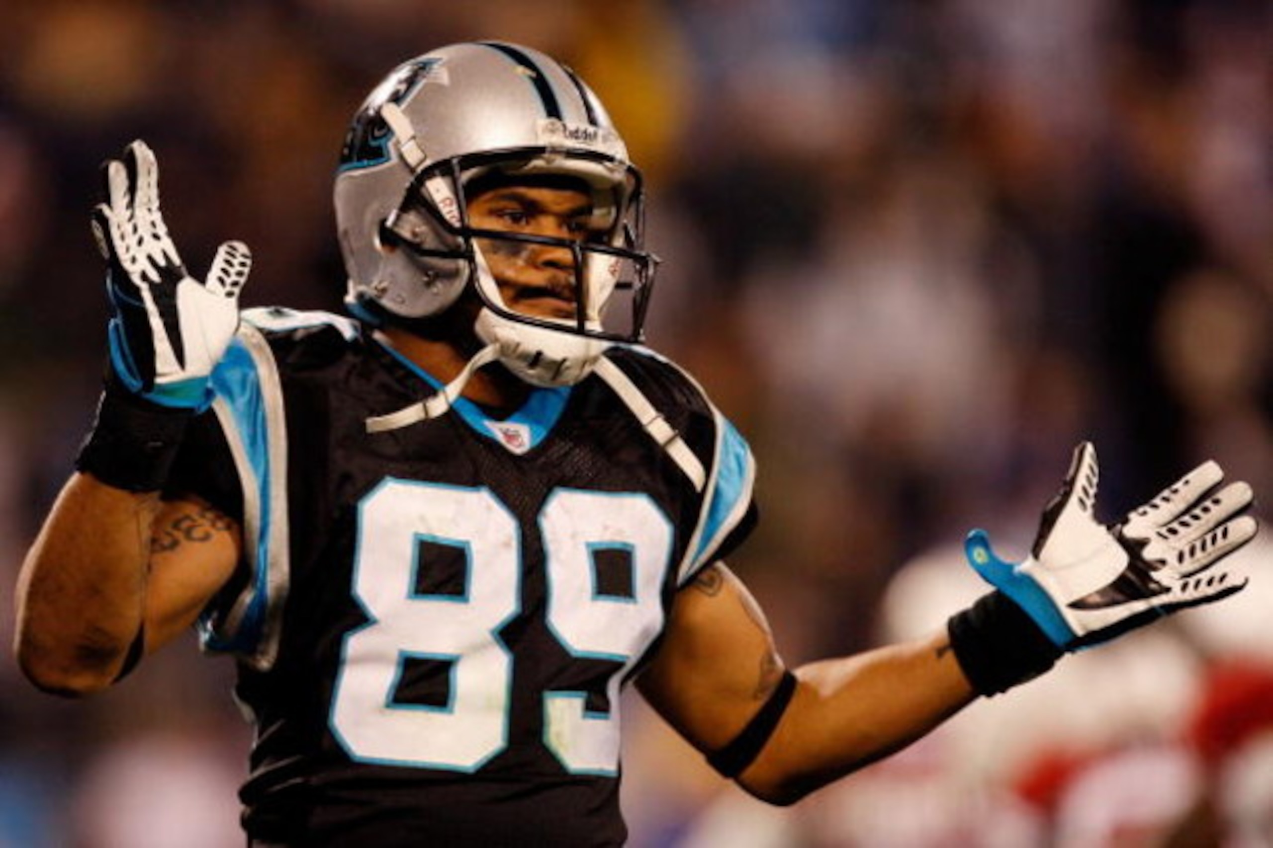 CHARLOTTE, NC - JANUARY 10:  Steve Smith #89 of the Carolina Panthers reacts to a play during the game against the Arizona Cardinals during the NFC Divisional Playoff Game on January 10, 2009 at Bank of America Stadium in Charlotte, North Carolina.  (Phot
