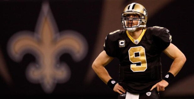 NEW ORLEANS - DECEMBER 28:  Quarterback Drew Brees #9 of the New Orleans Saints waits during a timeout against the Carolina Panthers 33-31 on December 28, 2008 at the Superdome in New Orleans, Louisiana.  (Photo by Chris Graythen/Getty Images)