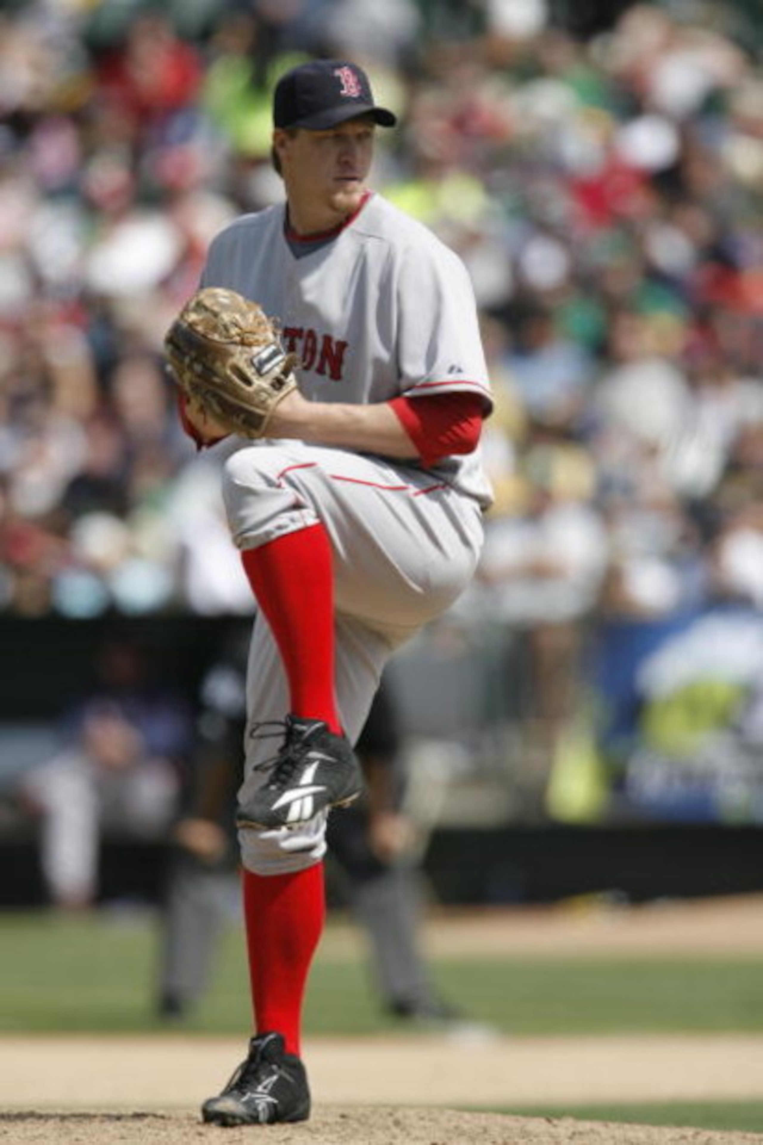 OAKLAND, CA - MAY 25:  Pitcher Mike Timlin #50 of the Boston Red Sox delivers a pitch during a game against the Oakland A's on May 25, 2008 at McAfee Coliseum in Oakland, California. Oakland won 6-3.  (Photo by Greg Trott/Getty Images)