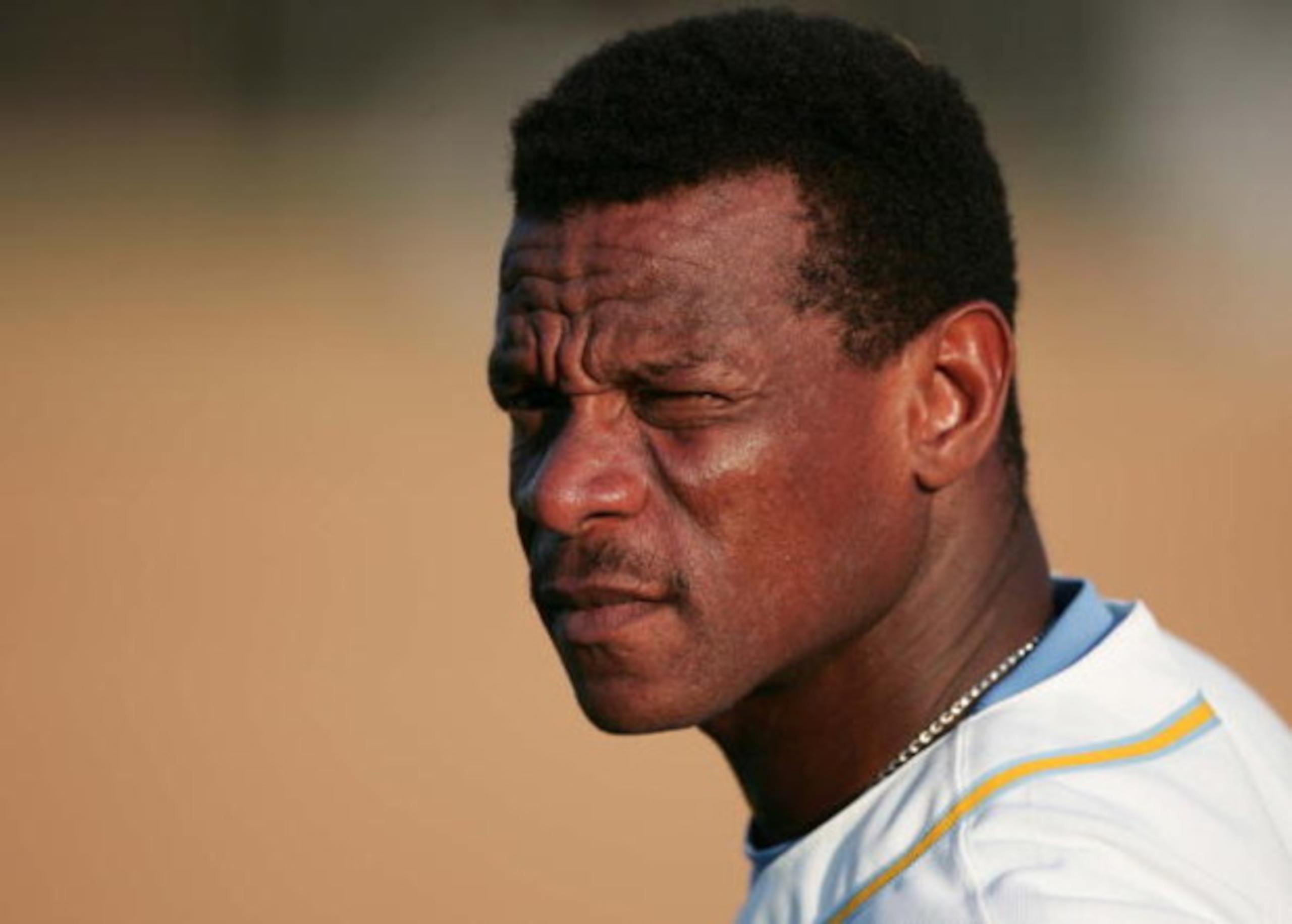 SAN DIEGO- JULY 18:  Rickey Henderson, who plays baseball for the San Diego Surf Dawgs of the Golden League, an independent professional baseball organization, looks on  before a game at Tony Gwyn Stadium in San Diego, California on July 18, 2005. A forme