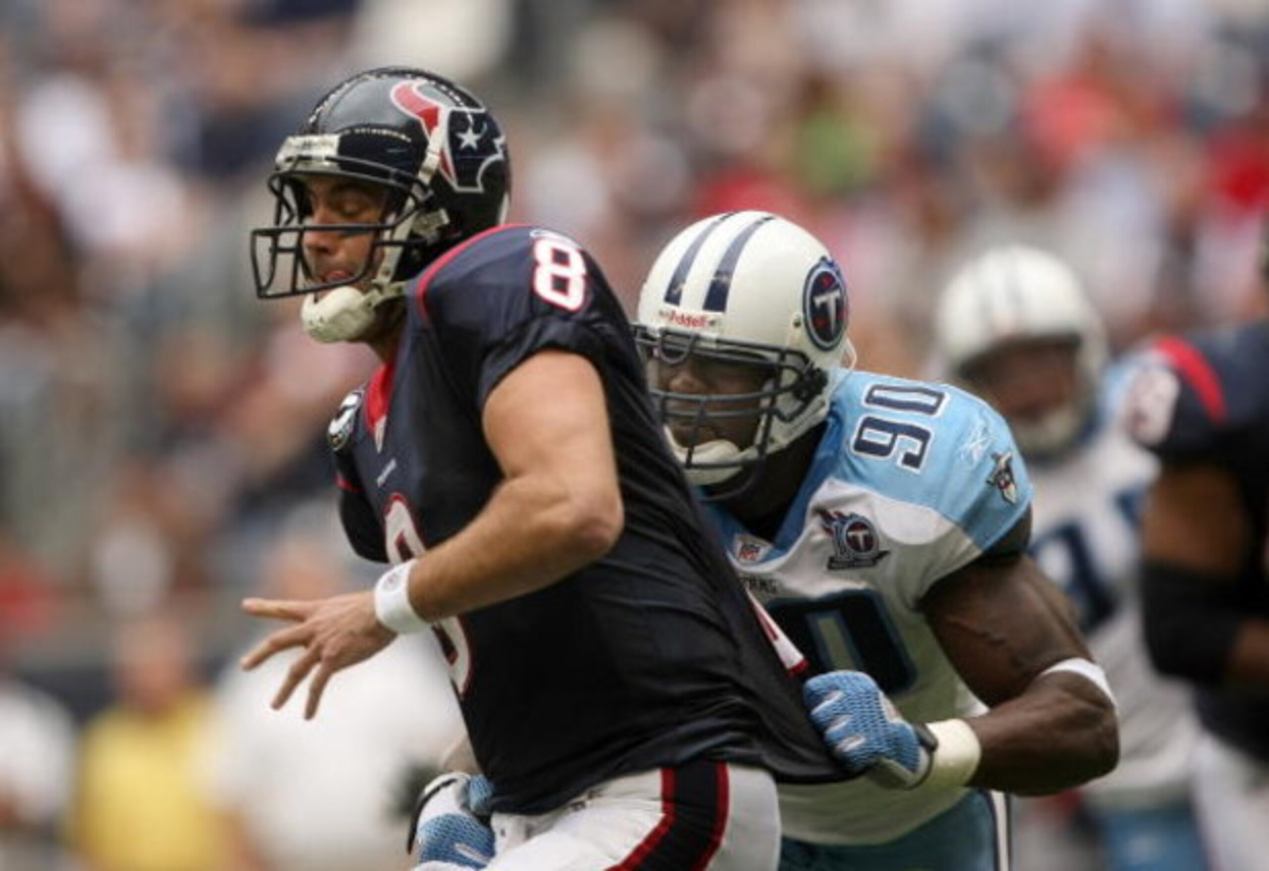 HOUSTON - DECEMBER 14:  Defensive end Jevon Kearse #90 of the Tennessee Titans sacks quarterback Matt Schaub #8 of the Houston Texans and forces a fumble on December 14, 2008 at Reliant Stadium in Houston, Texas.  The Texans won 13-12.  (Photo by Stephen 