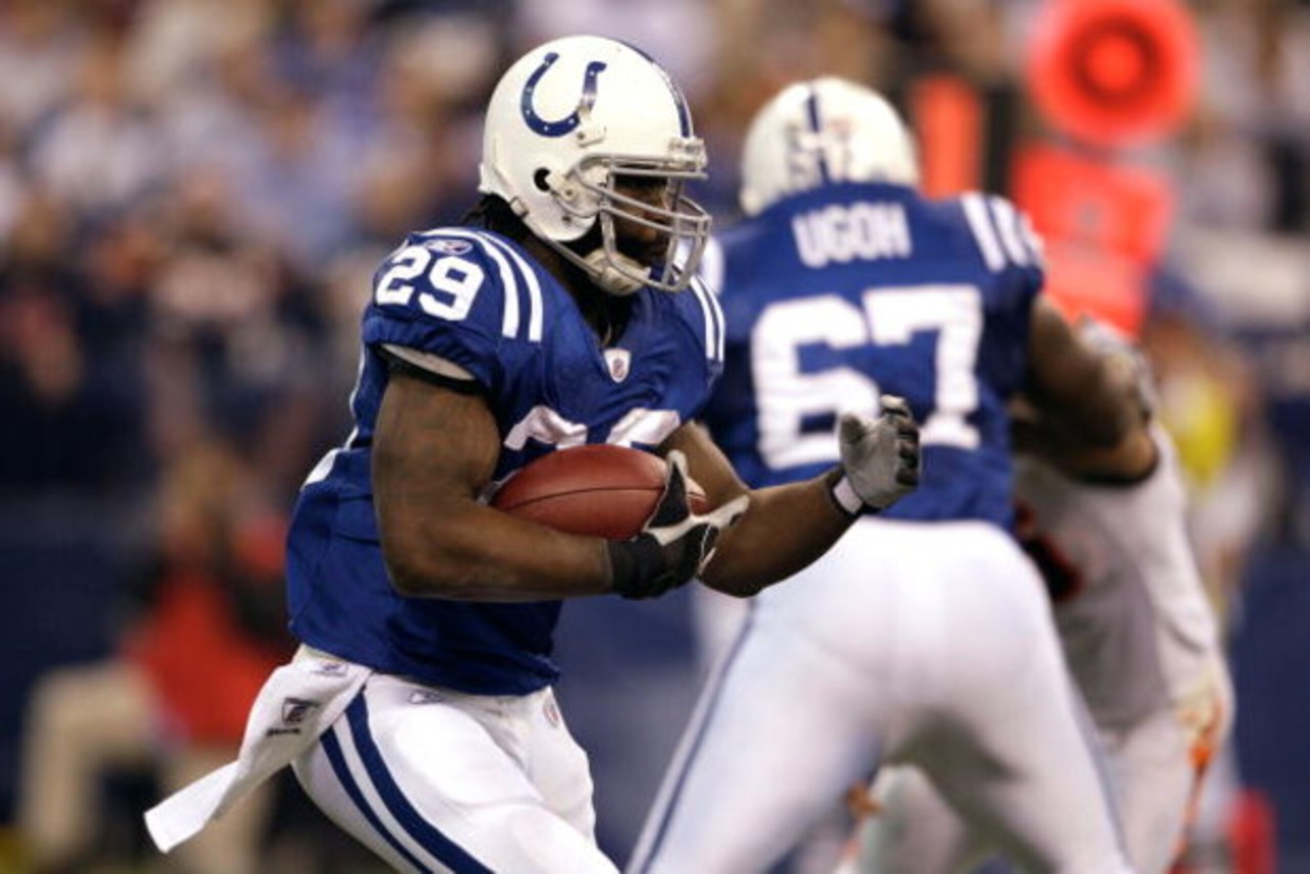 INDIANAPOLIS - DECEMBER 07:  Joseph Addai #29 of the Indianapolis Colts runs the ball against the Cincinnati Bengals at Lucas Oil Stadium on December 7, 2008 in Indianapolis, Indiana.  (Photo by Andy Lyons/Getty Images)