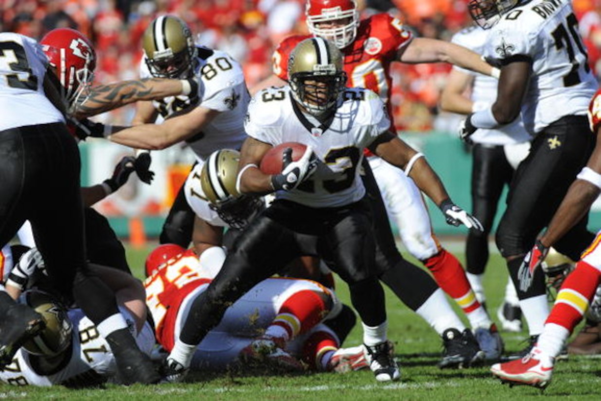 KANSAS CITY, MO - NOVEMBER 16:  Pierre Thomas #23 of the  New Orleans Saints runs for yardage against the Kansas City Chiefs on November 16, 2008 at Arrowhead Stadium in Kansas City, Missouri.  (Photo by G. Newman Lowrance/Getty Images)