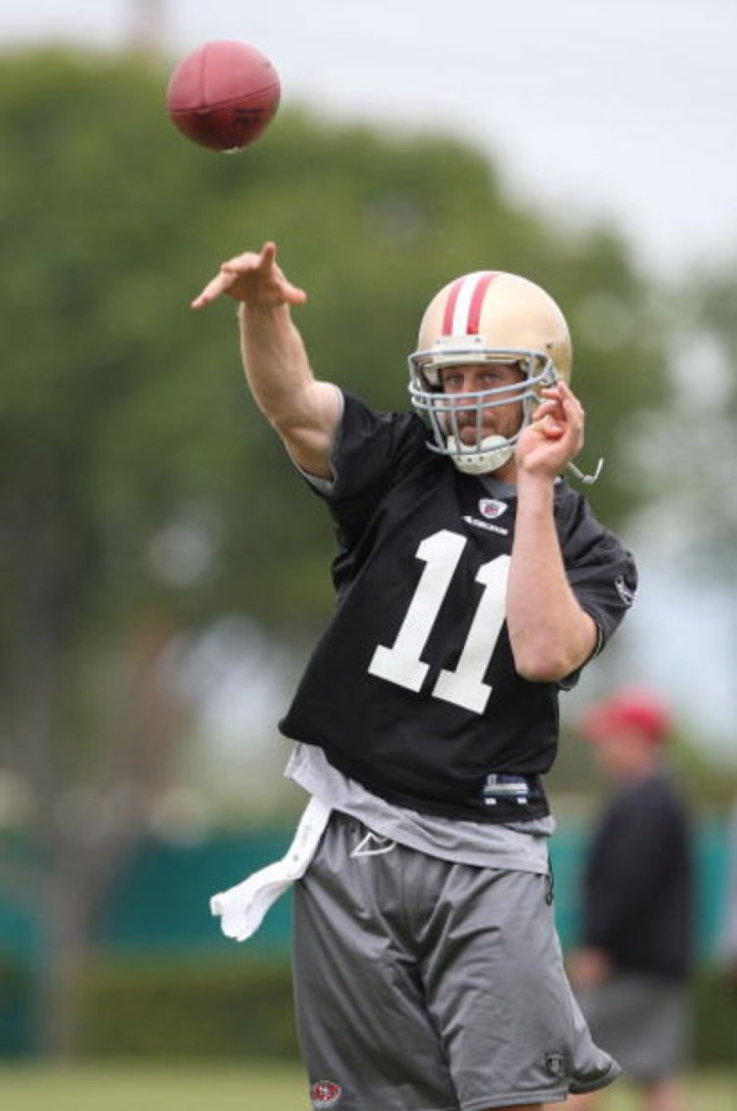 SANTA CLARA, CA - MAY 01:  Quarterback Alex Smith #11 of the San Francisco 49ers throws the ball during the 49ers Minicamp at their training facilities on May 1, 2009 in Santa Clara, California.  (Photo by Jed Jacobsohn/Getty Images)