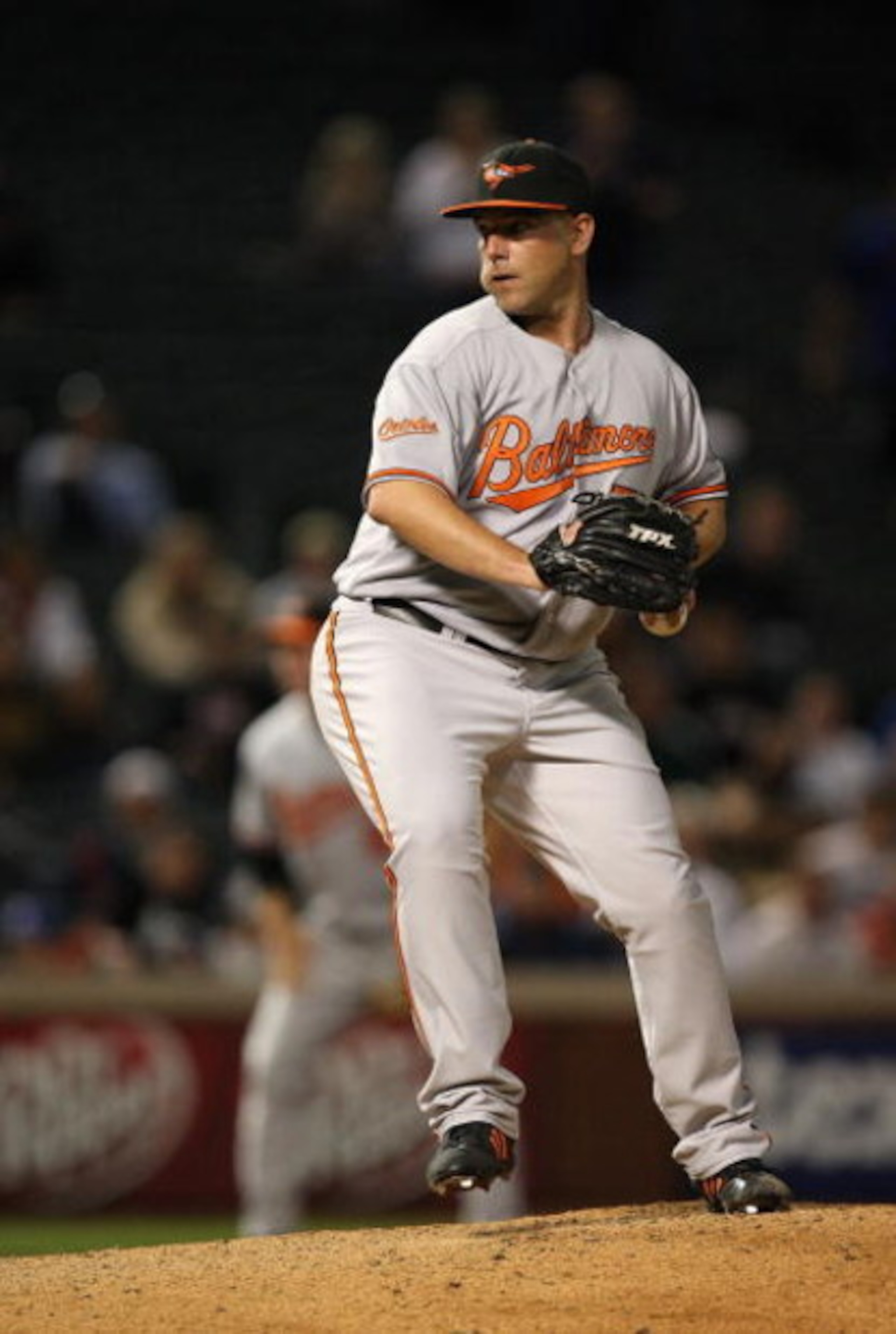 ARLINGTON, TX - APRIL 13:  Pitcher George Sherrill #52 of the Baltimore Orioles during play against the Texas Rangers on April 13, 2009 at Rangers Ballpark in Arlington, Texas.  (Photo by Ronald Martinez/Getty Images)