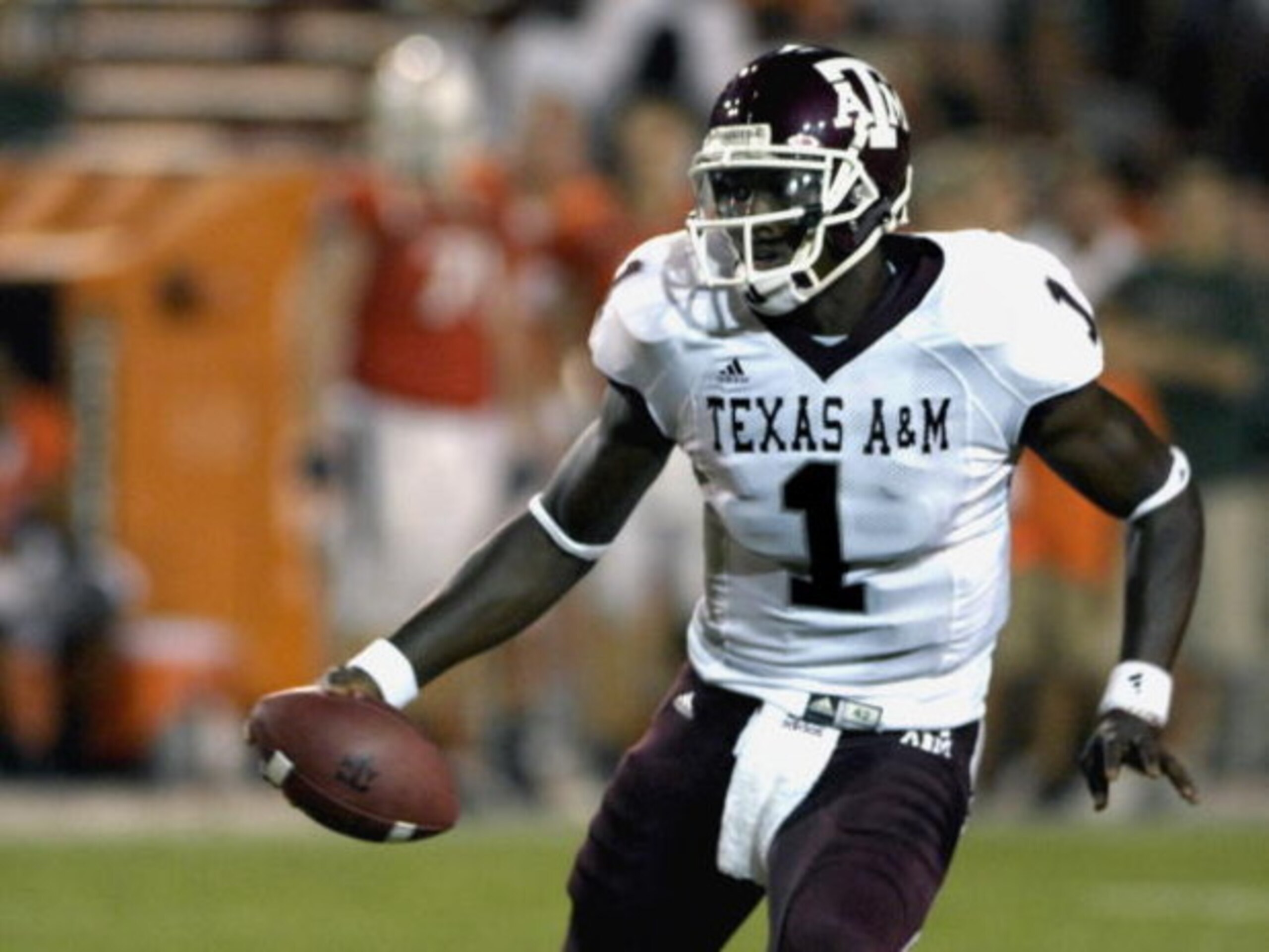 MIAMI, FL - SEPTEMBER 20: Quarterback Jerrod Johnson #1 of Texas A & M  rushes for a gain against the University of Miami at the Orange Bowl September 20, 2007 in Miami, Florida.  Miami won 31 - 17. (Photo by Al Messerschmidt/Getty Images)