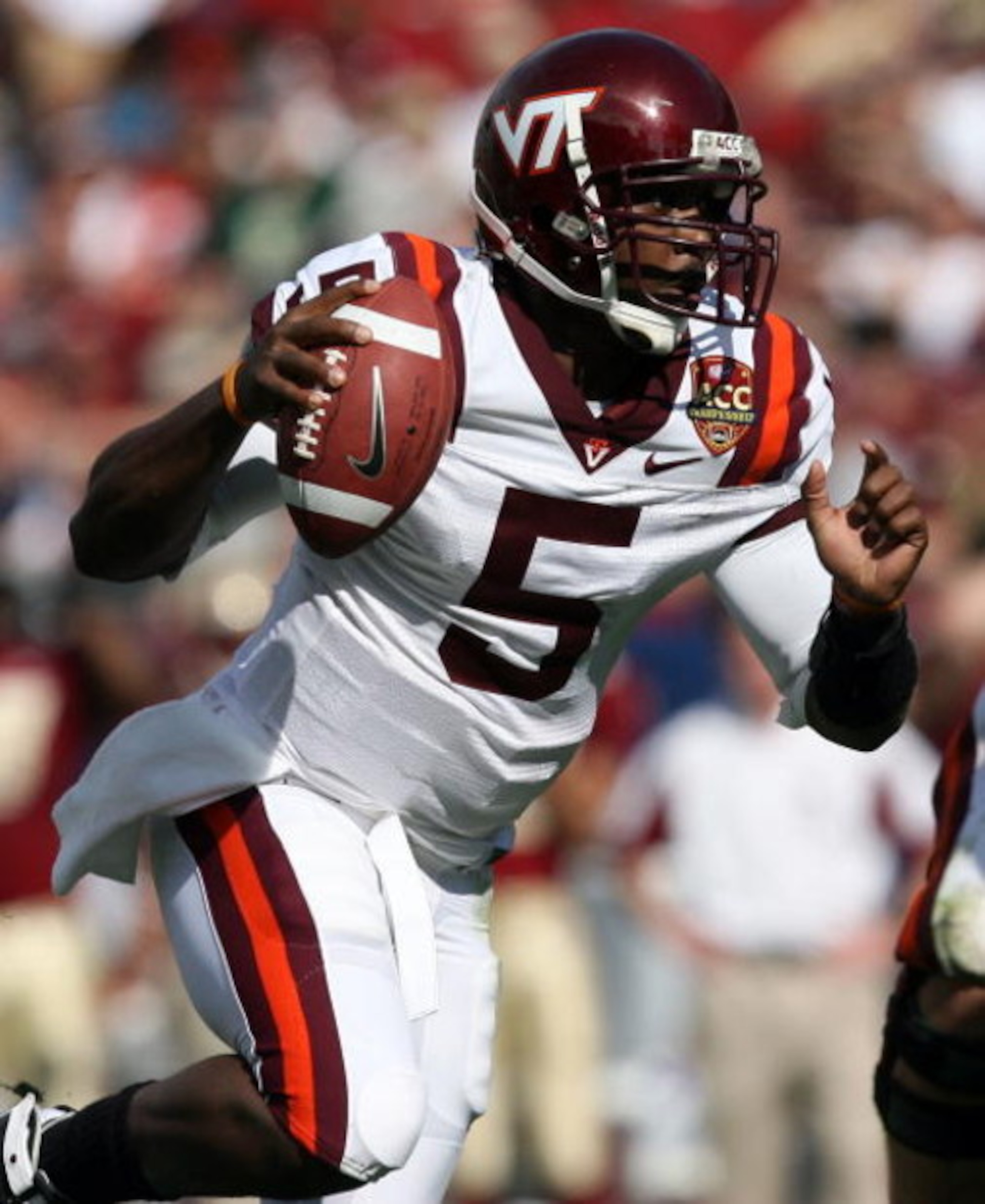 TAMPA, FL - DECEMBER 06:  Quarterback Tyrod Taylor #5 of the Virginia Tech Hokies runs for a touchdown in the first quarter against the Boston College Eagles in the 2008 ACC Football Championship game at the Raymond James Stadium on December 6, 2008 in Ta