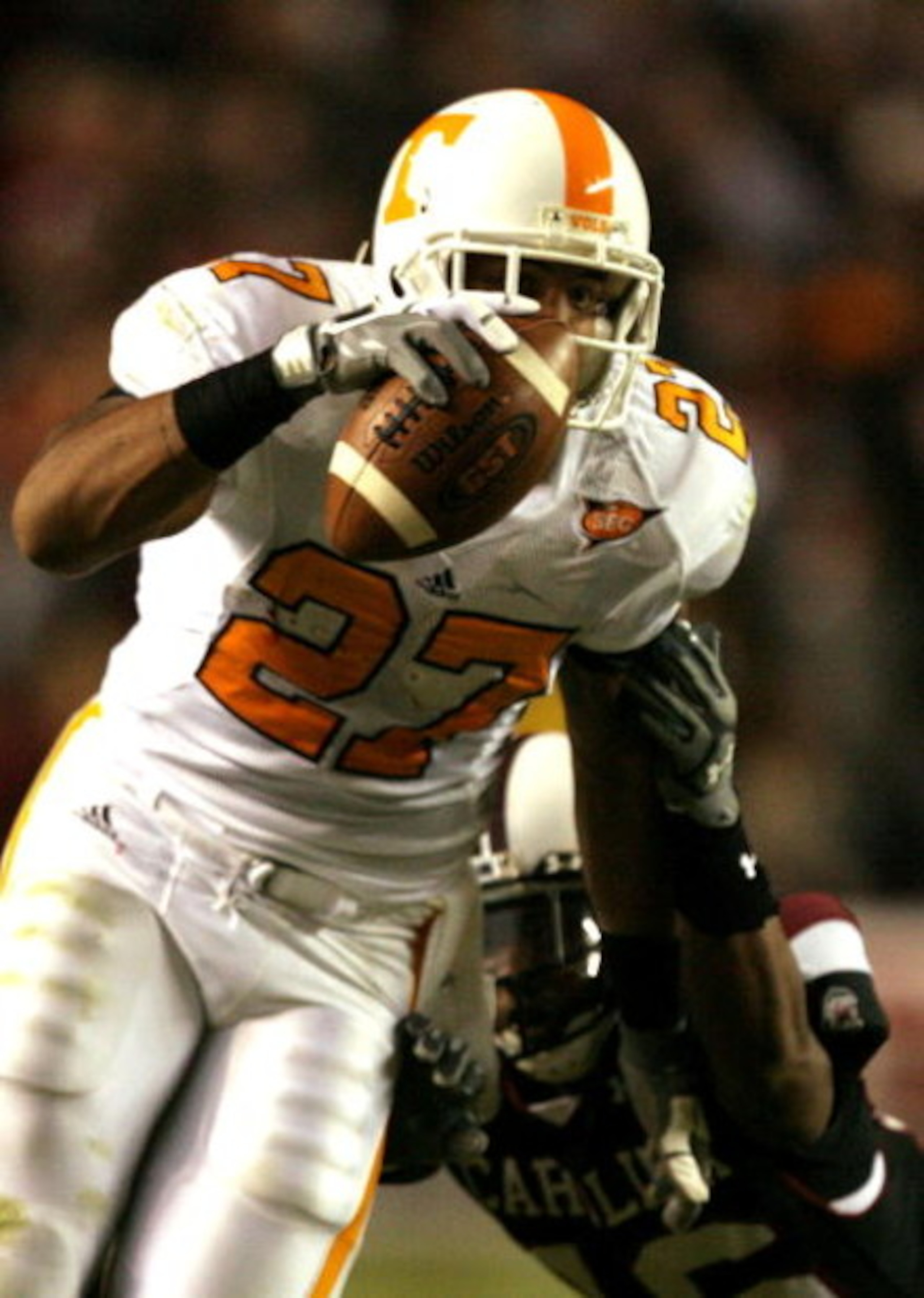 COLUMBIA, SC - NOVEMBER 01:  Arian Foster #27 of the Tennessee Volunteers tries to run away from Shaq Wilson #16 of the South Carolina Gamecocks during their game at Williams-Brice Stadium on November 1, 2008 in Columbia, South Carolina.  (Photo by Street