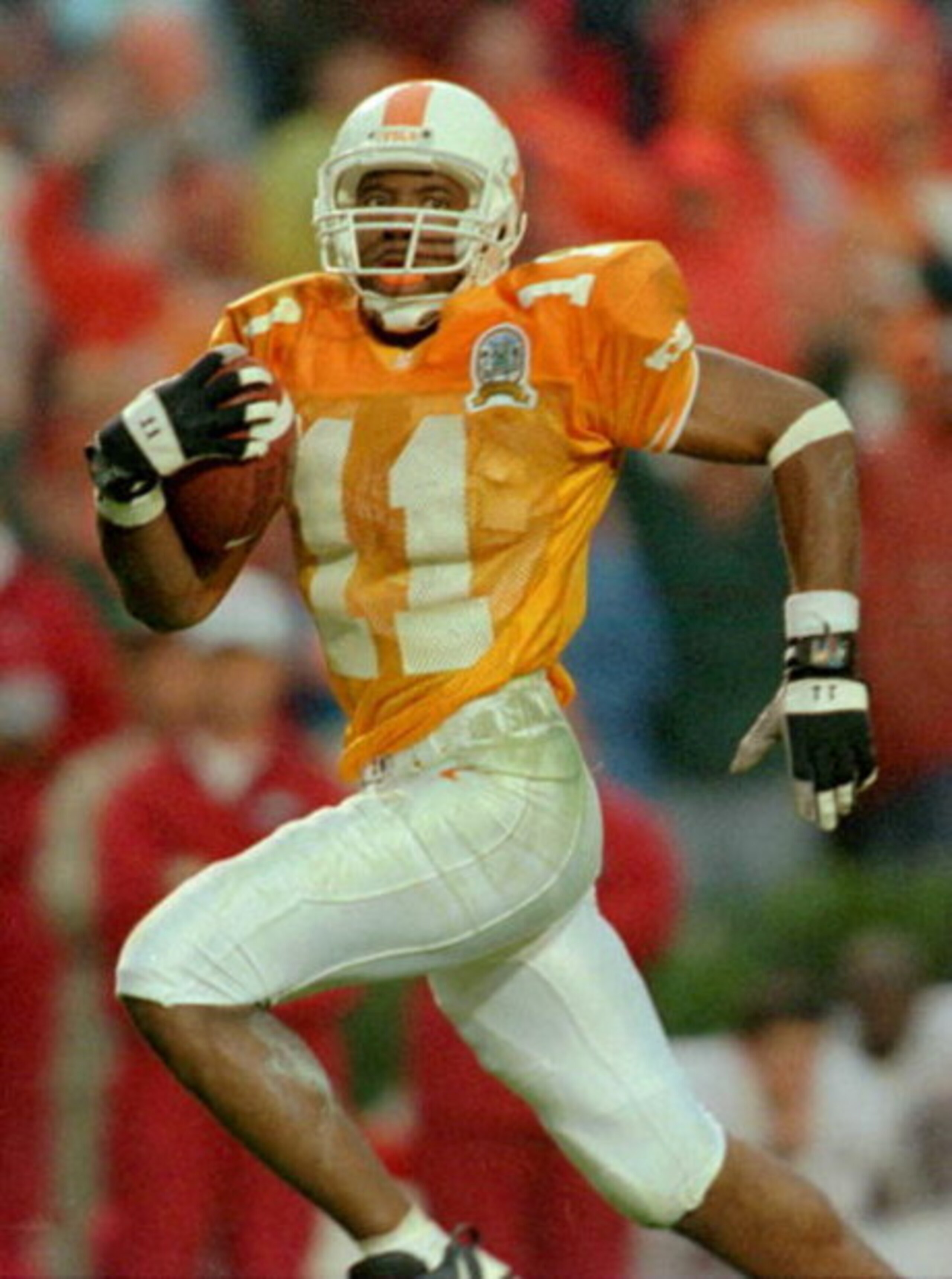 26 Oct 1996:  Joey Kent #11 of Tennessee runs with the ball for a 54 yard touchdown pass reception during the third quarter of their 20-13 victory over Alabama at Neyland Stadium in Knoxville, Tennessee.   Mandatory Credit: Andy Lyons/Allsport