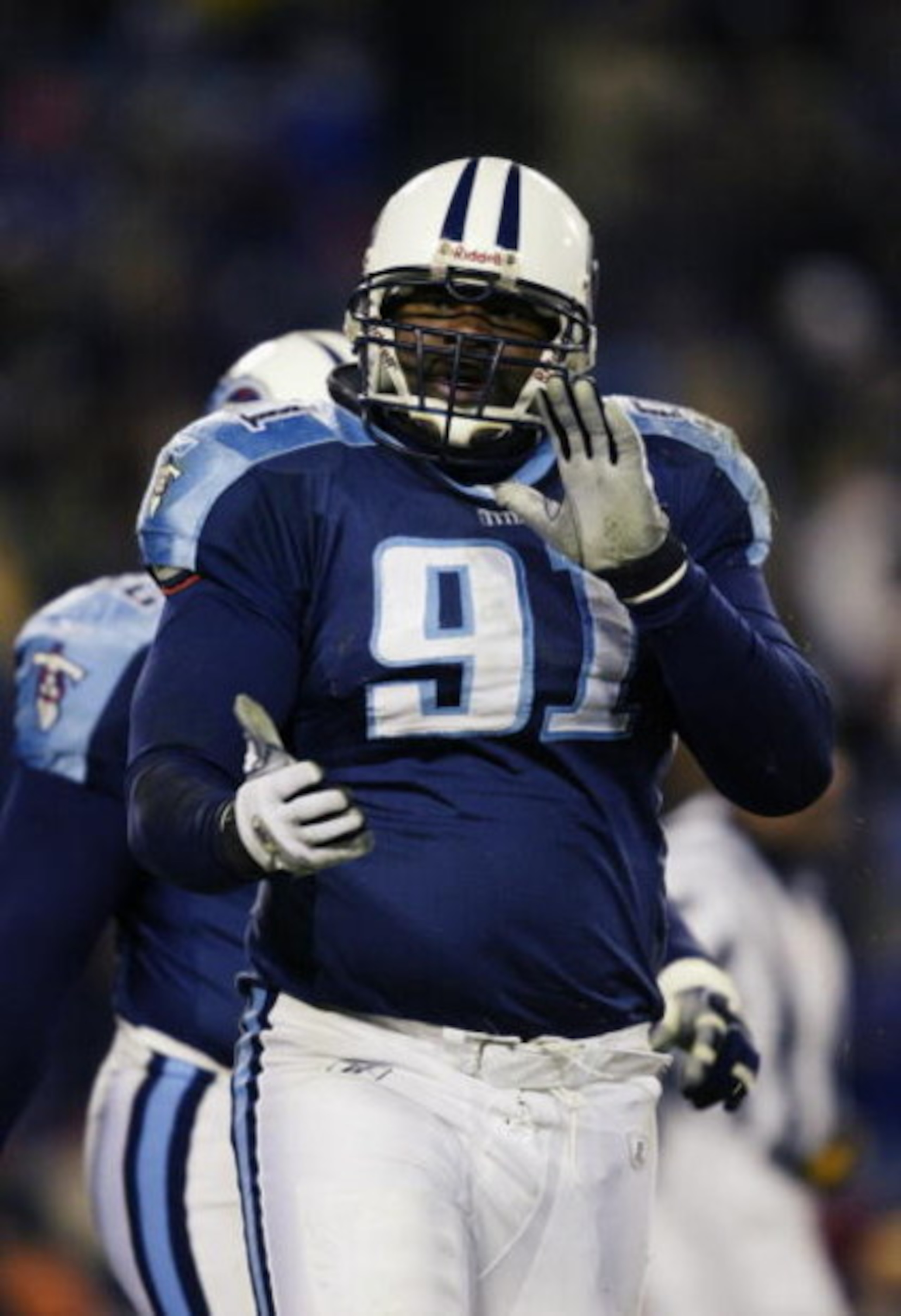 NASHVILLE, TN - JANUARY 11:  Albert Haynesworth #91 of the Tennessee Titans looks on against the Pittsburgh Steelers at the Coliseum on January 11, 2003 in Nashville, Tennessee. TheTitans won 34-31 in overtime to advance to the AFC Championship game. (Pho