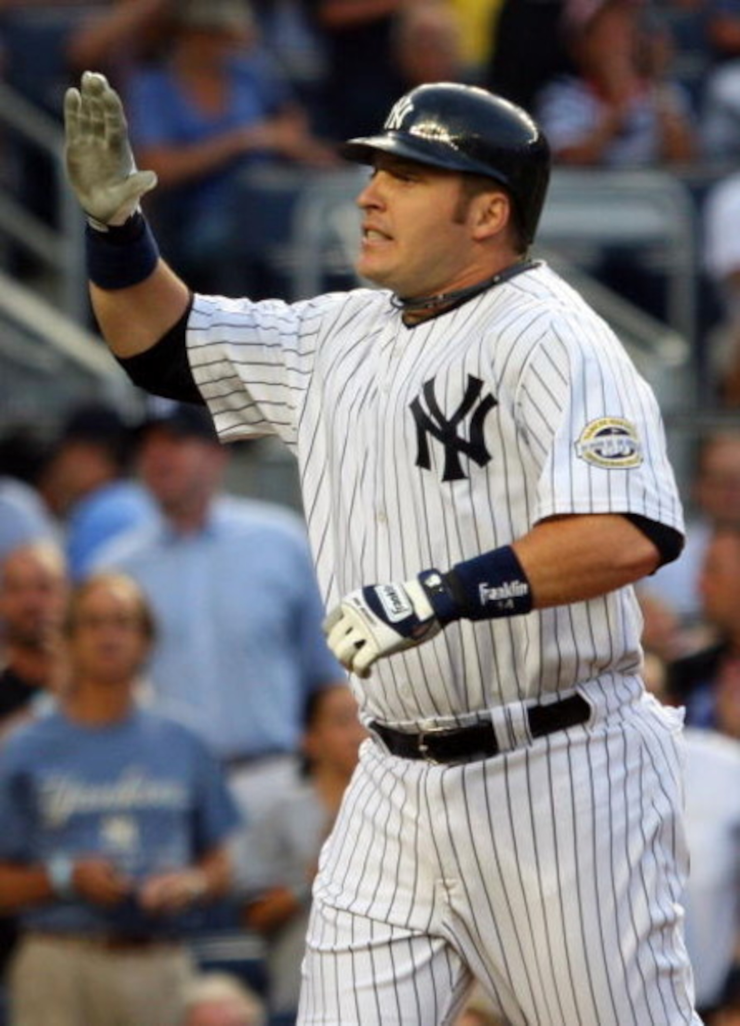 NEW YORK - JULY 20:  Eric Hinske #14 of the New York Yankees celebrates against the Baltimore Orioles on July 20, 2009 at Yankee Stadium in the Bronx borough of New York City.  (Photo by Jim McIsaac/Getty Images)