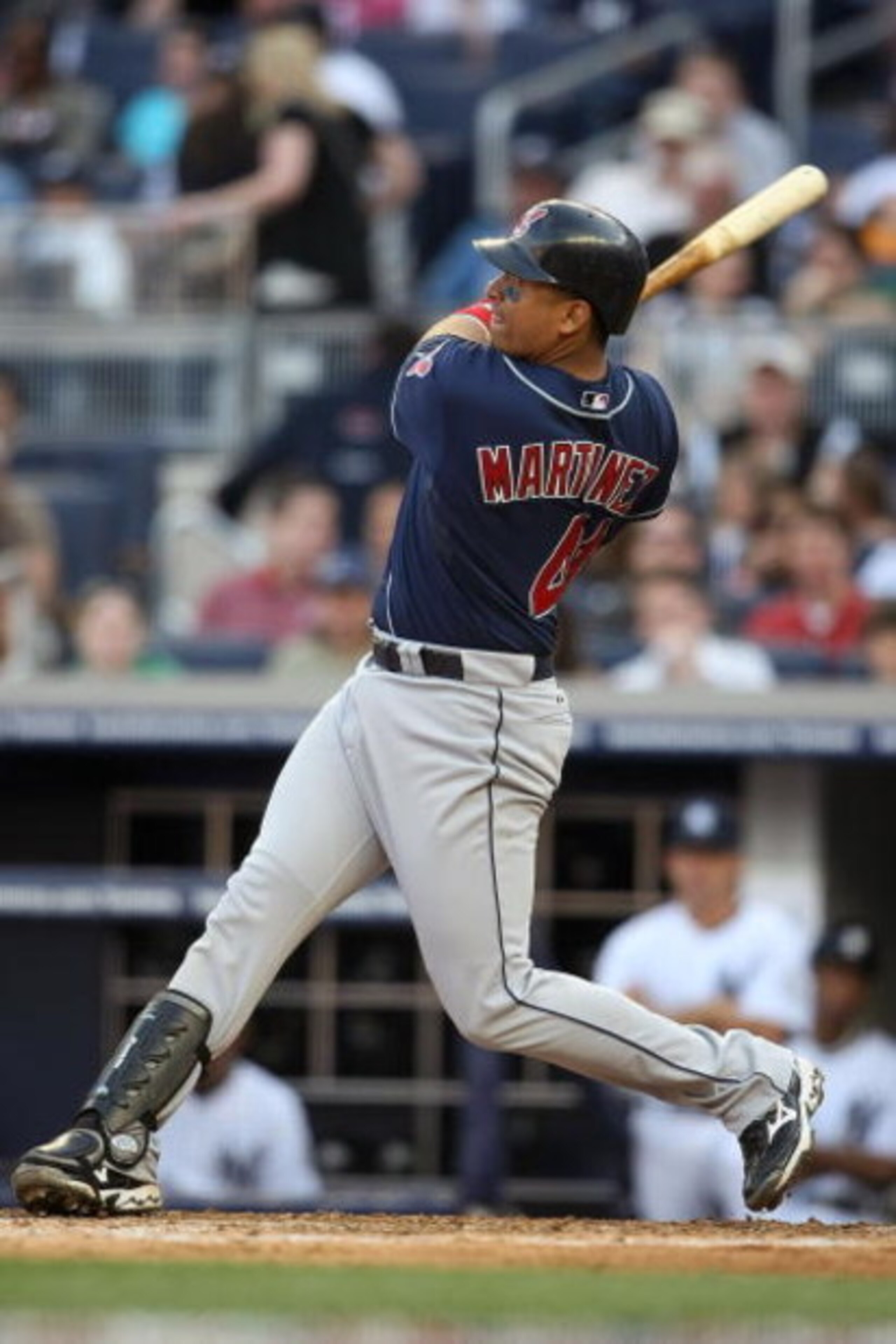 NEW YORK - APRIL 18:  Victor Martinez #41 of the Cleveland Indians hits a solo home run against the New York Yankees at Yankee Stadium on April 18, 2009 in the Bronx borough of New York City.  (Photo by Nick Laham/Getty Images)