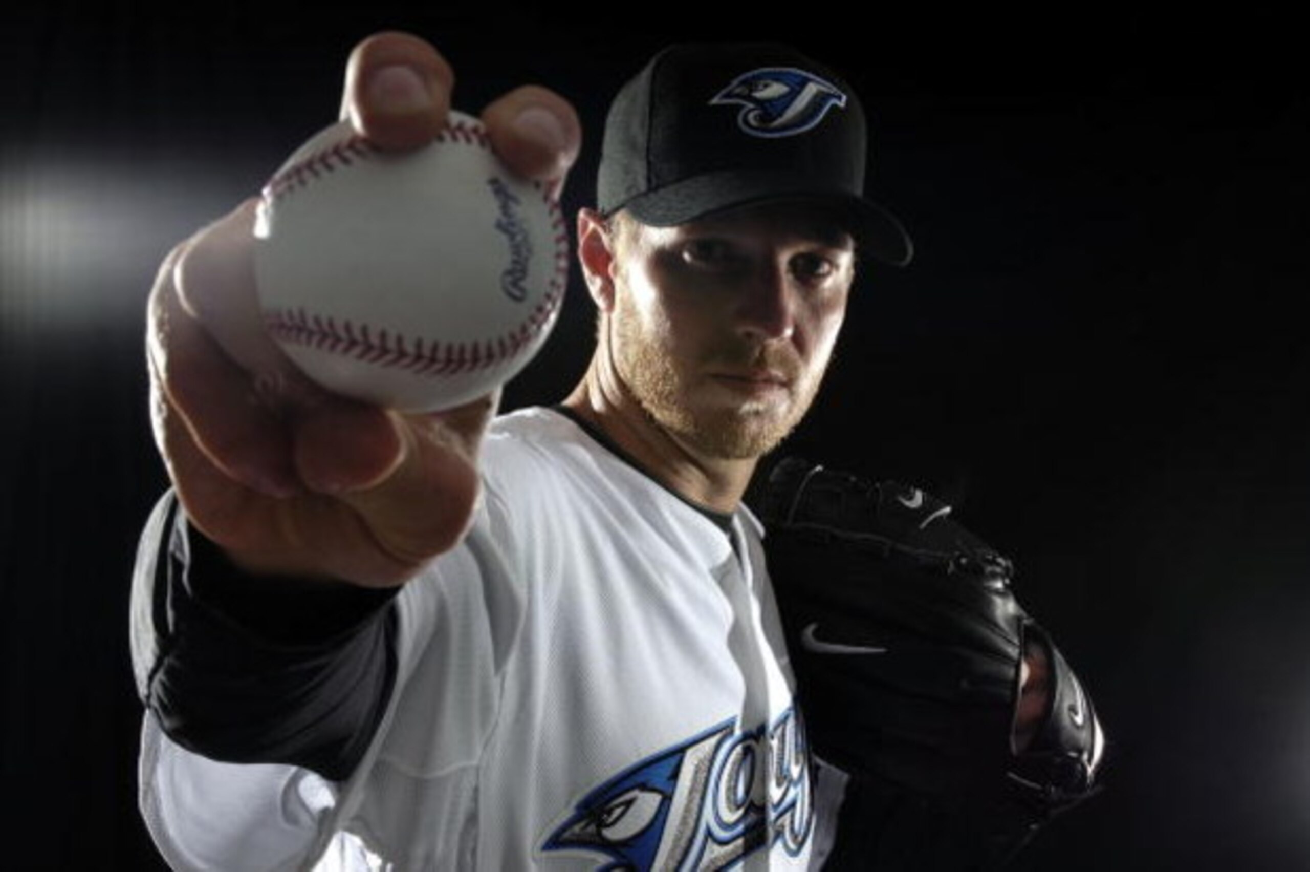 DUNEDIN, FL - FEBRUARY 22:  Pitcher Roy Halladay #32 of the Toronto Blue Jays poses for a photo on media day during spring training at the Bobboy Mattix Traing Center February 22, 2008 in Dunedin, Florida.  (Photo by Marc Serota/Getty Images)