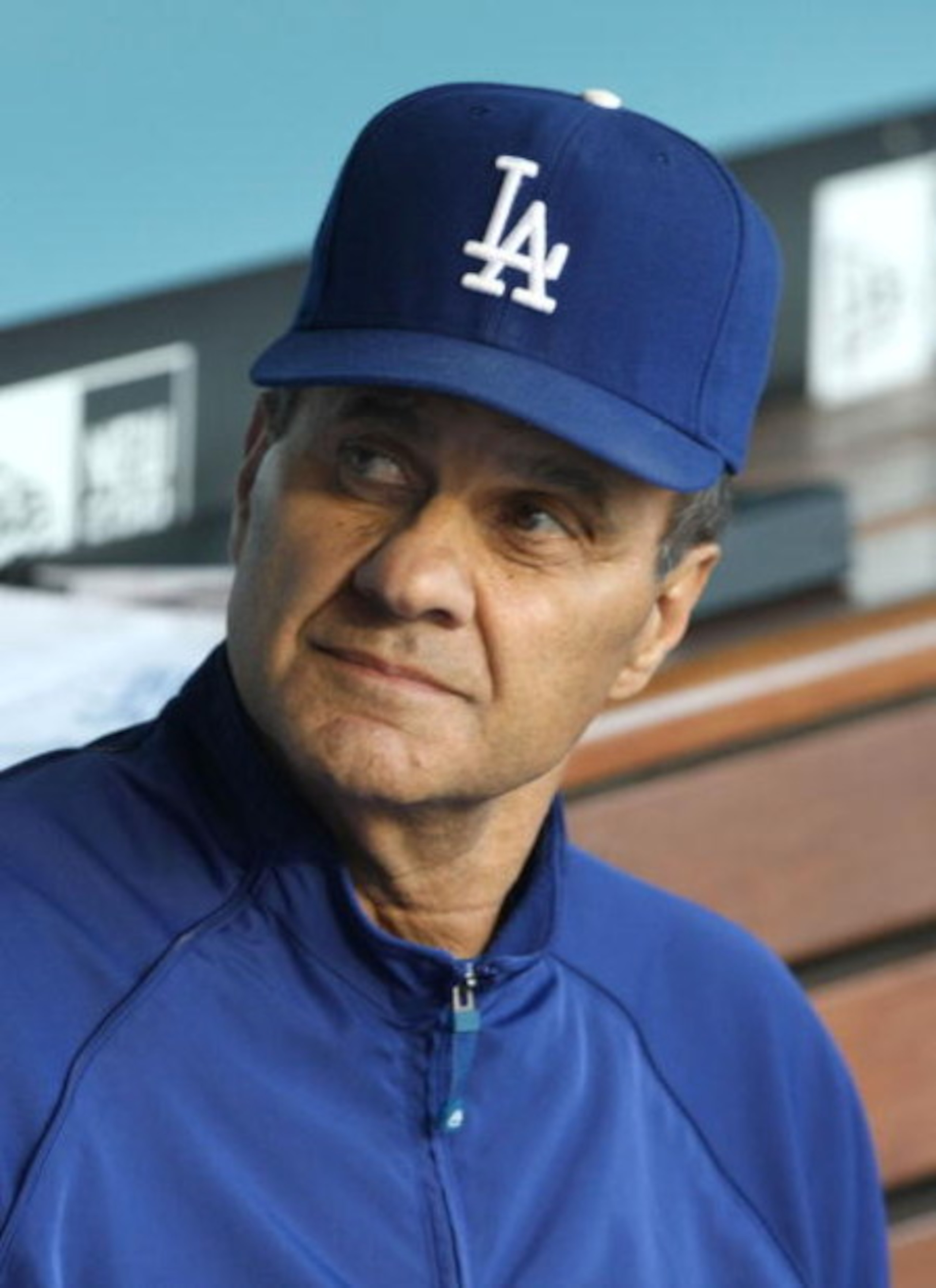 LOS ANGELES, CA - JULY 16:  Manager Joe Torre of the Los Angeles Dodgers looks on in the dugout during the game against the Houston Astros on July 16, 2009 at Dodger Stadium in Los Angeles, California.  (Photo by Stephen Dunn/Getty Images)