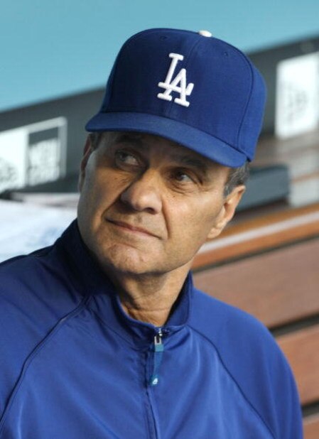 LOS ANGELES, CA - JULY 16:  Manager Joe Torre of the Los Angeles Dodgers looks on in the dugout during the game against the Houston Astros on July 16, 2009 at Dodger Stadium in Los Angeles, California.  (Photo by Stephen Dunn/Getty Images)