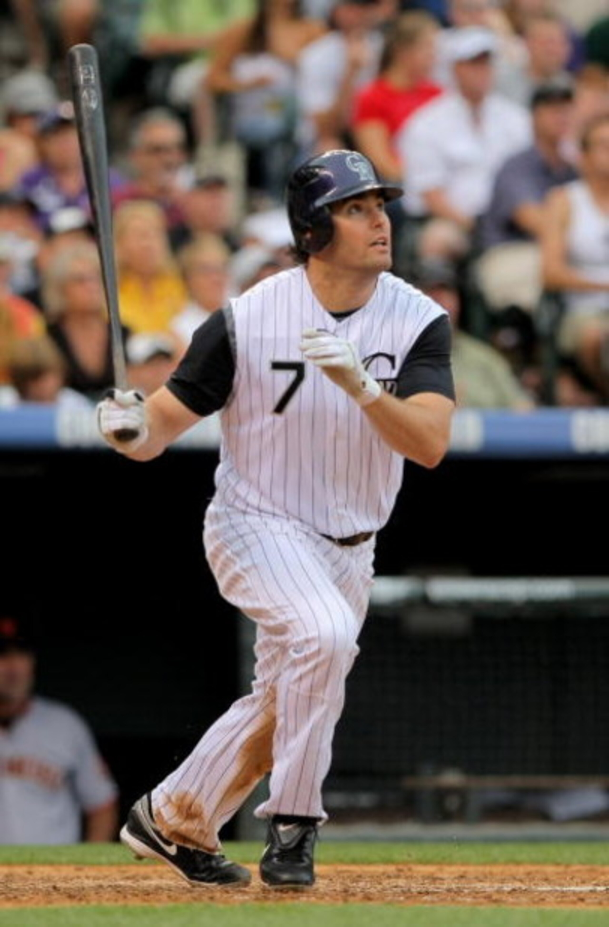 DENVER - JULY 26:  Seth Smith #7 of the Colorado Rockies takes an at bat against the San Francisco Giants at Coors Field on July 26, 2009 in Denver, Colorado. The Rockies defeated the Giants 4-2.  (Photo by Doug Pensinger/Getty Images)