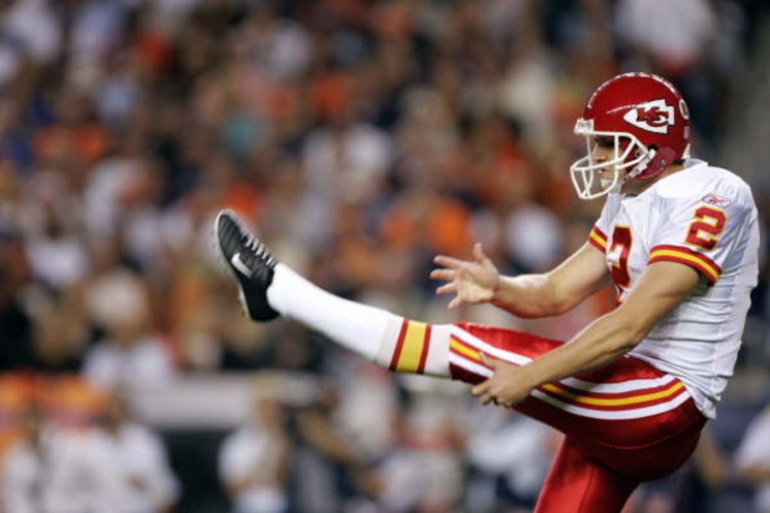 DENVER - SEPTEMBER 26:  Dustin Colquitt #2 of the Kansas City Chiefs kicks during the game with the Denver Broncos on September 26, 2005 at Invesco Field at Mile High stadium in Denver, Colorado.  The Broncos won 30-10.  (Photo by Brian Bahr/Getty Images)